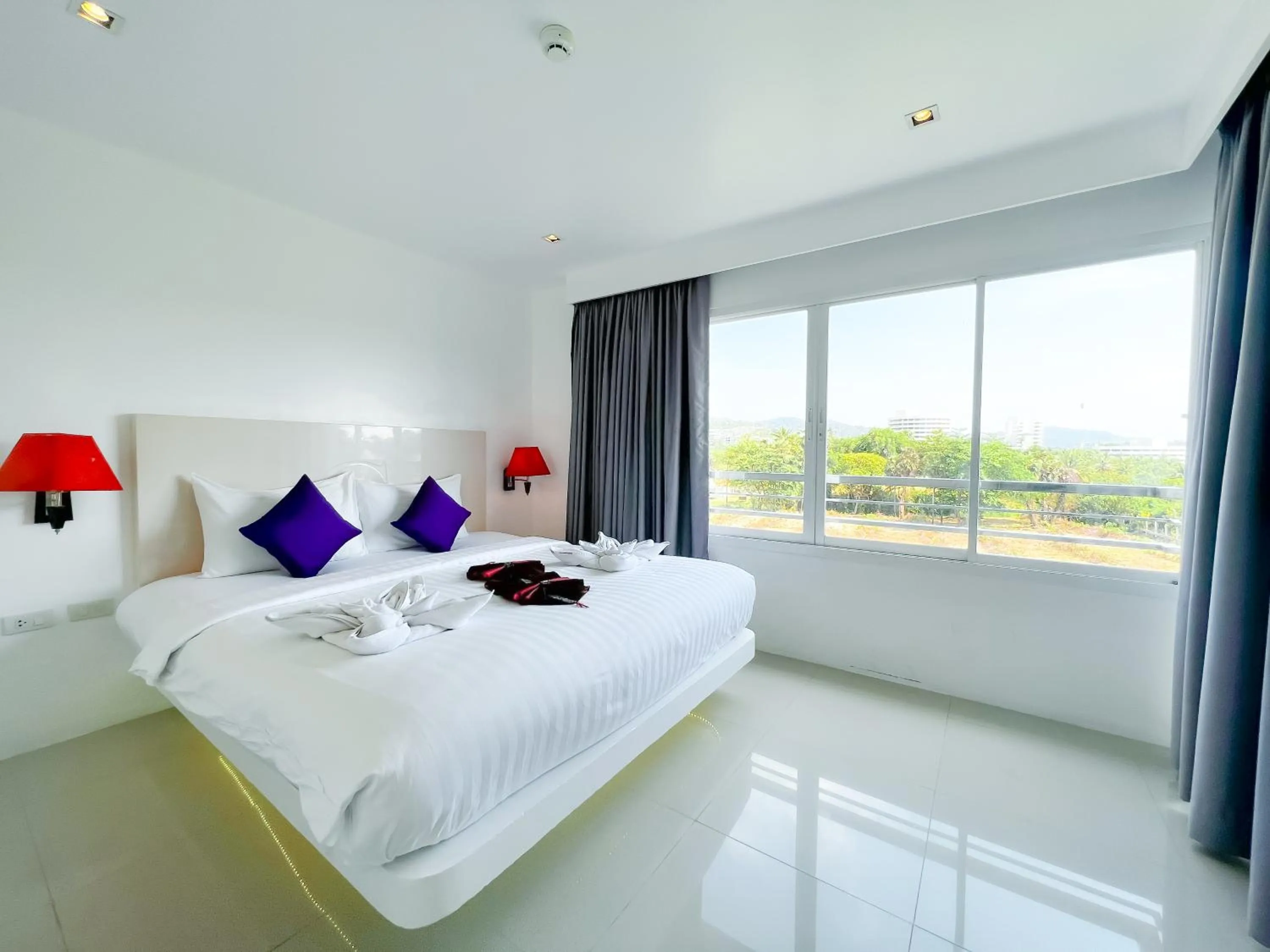 Bed in Grand Sunset Hotel Phuket