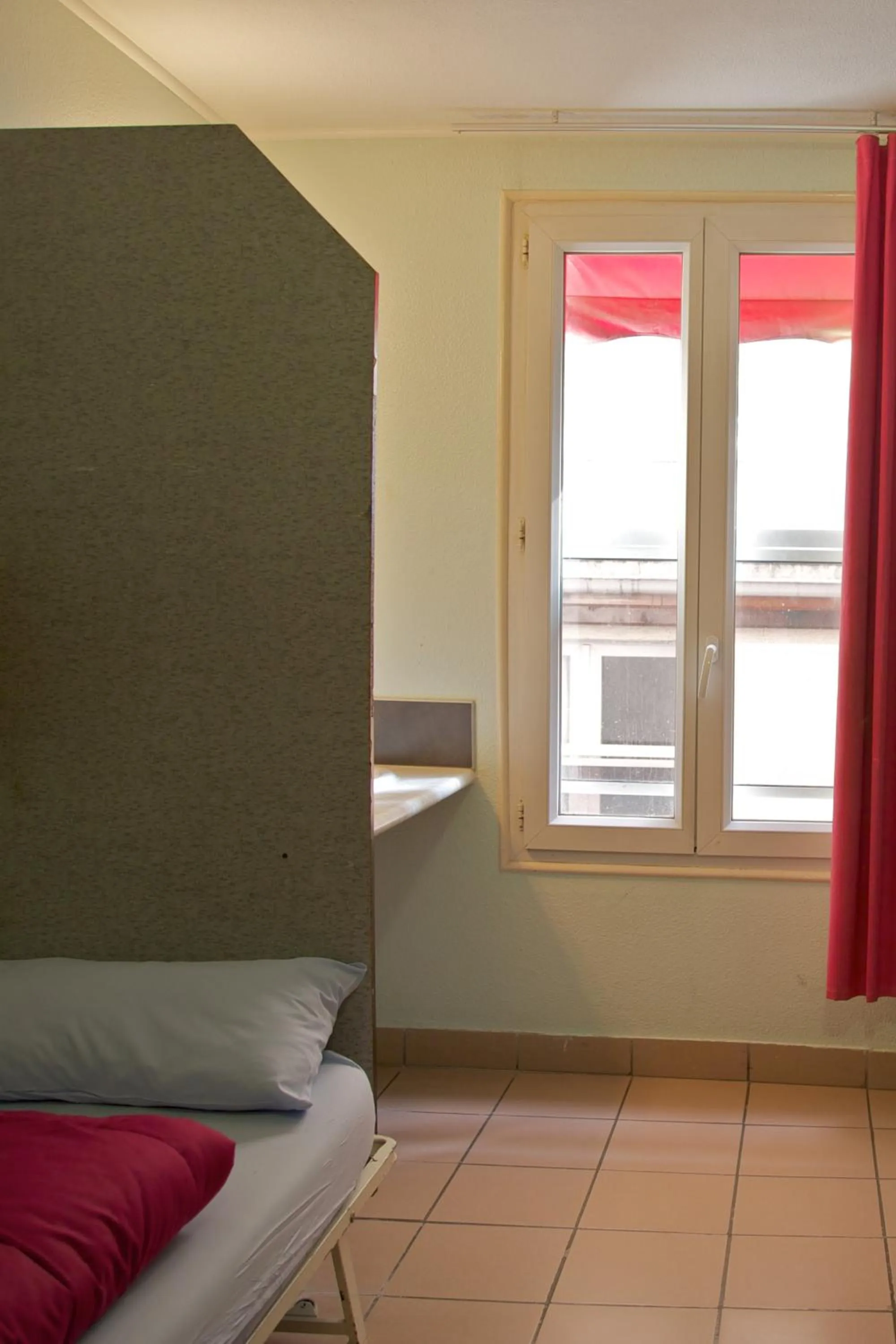 Bed in Auberge Internationale des Jeunes