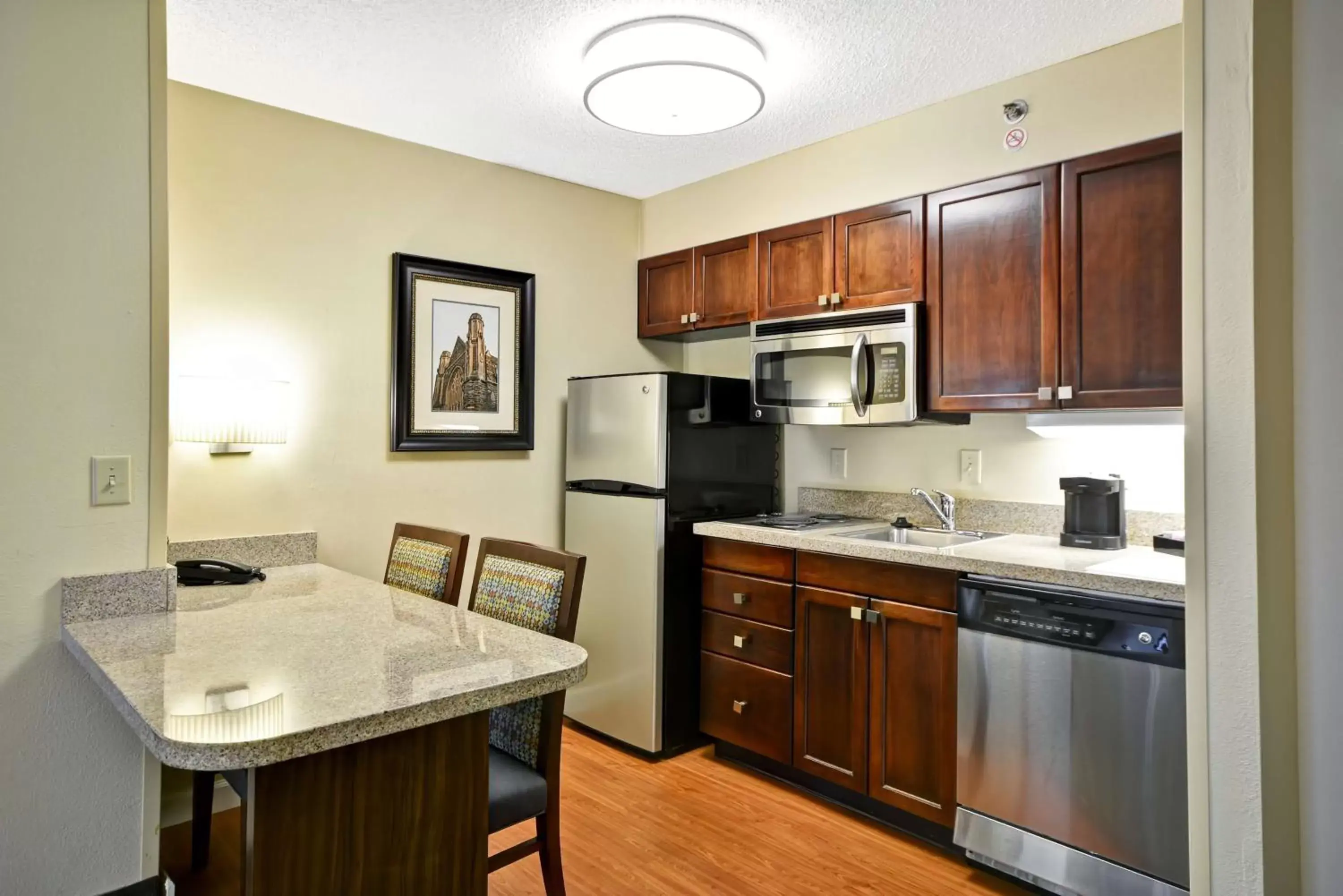 Bedroom, Kitchen/Kitchenette in Homewood Suites Durham-Chapel Hill I-40