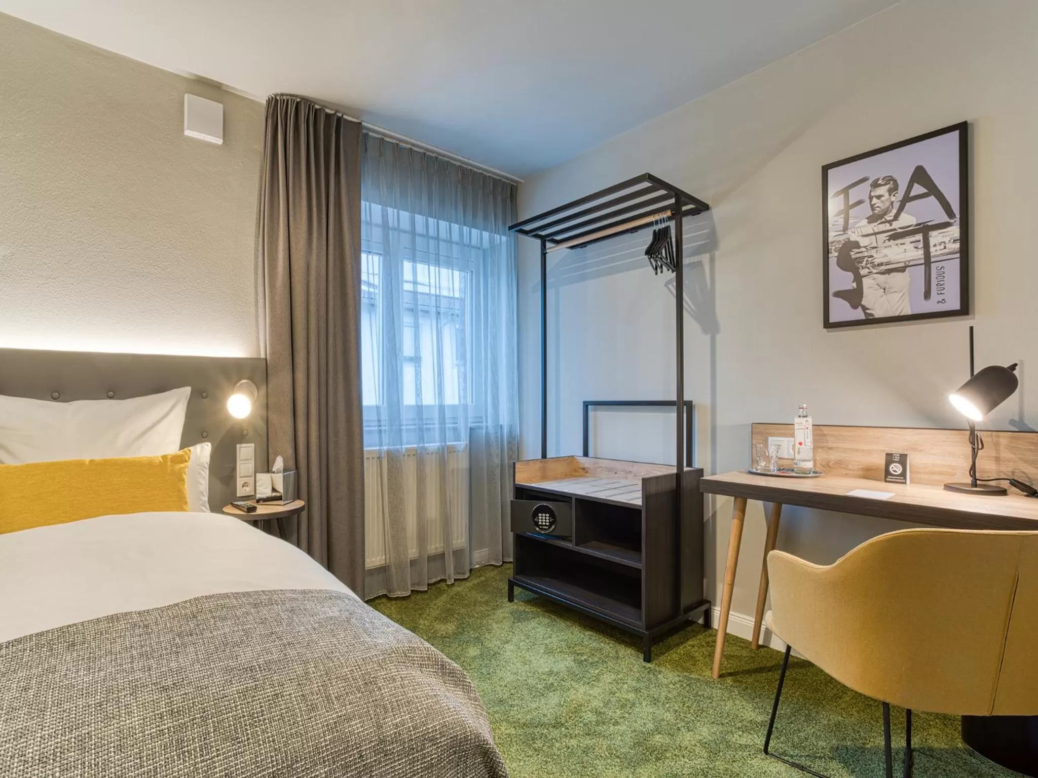 Photo of the whole room, TV/Entertainment Center in NYCE Hotel Ingolstadt