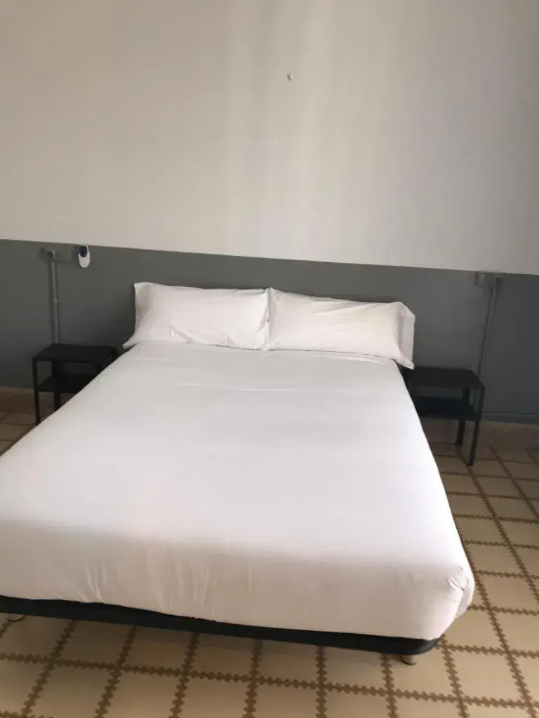 Bed in Hotel Monegal Bed in Hotel Monegal