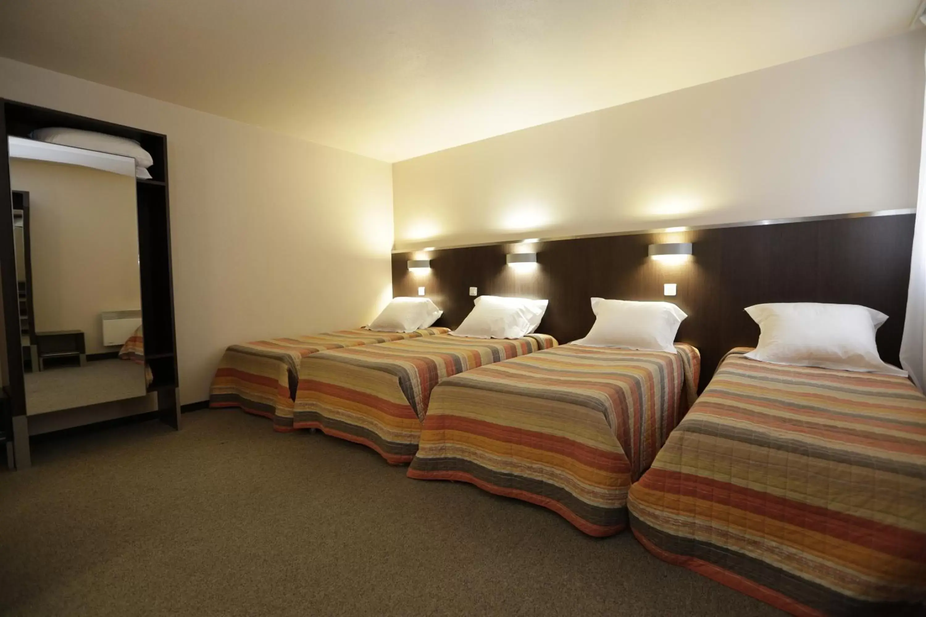 Bedroom, Bed in Hôtel Au Petit Caporal