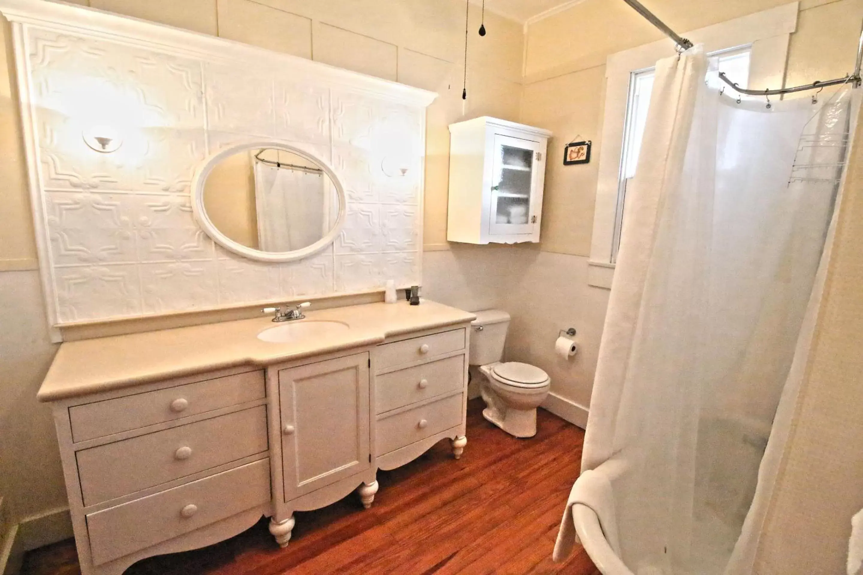 Bathroom in Peach Tree Inn & Suites