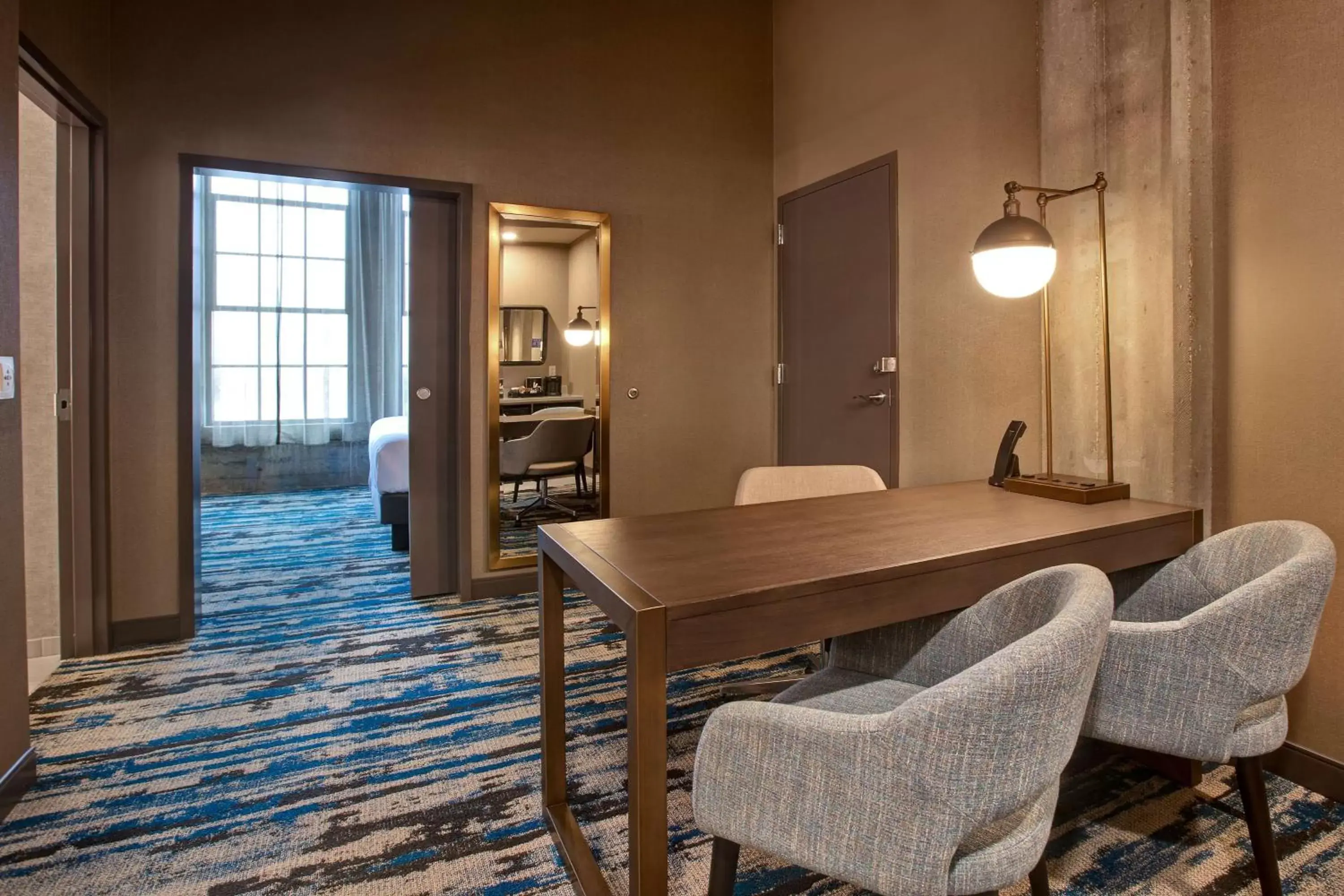Bedroom, Dining Area in Embassy Suites By Hilton Rockford Riverfront