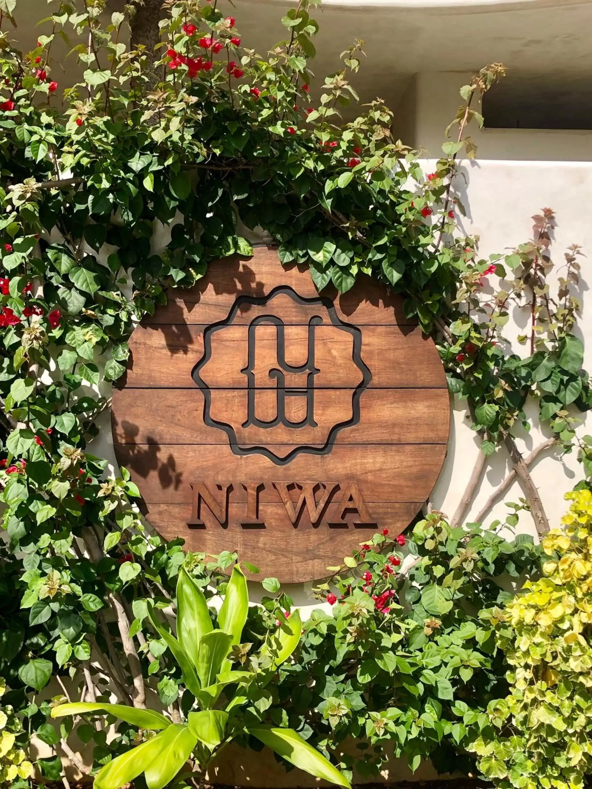 Logo/Certificate/Sign in Niwa Tulum Luxury Suites