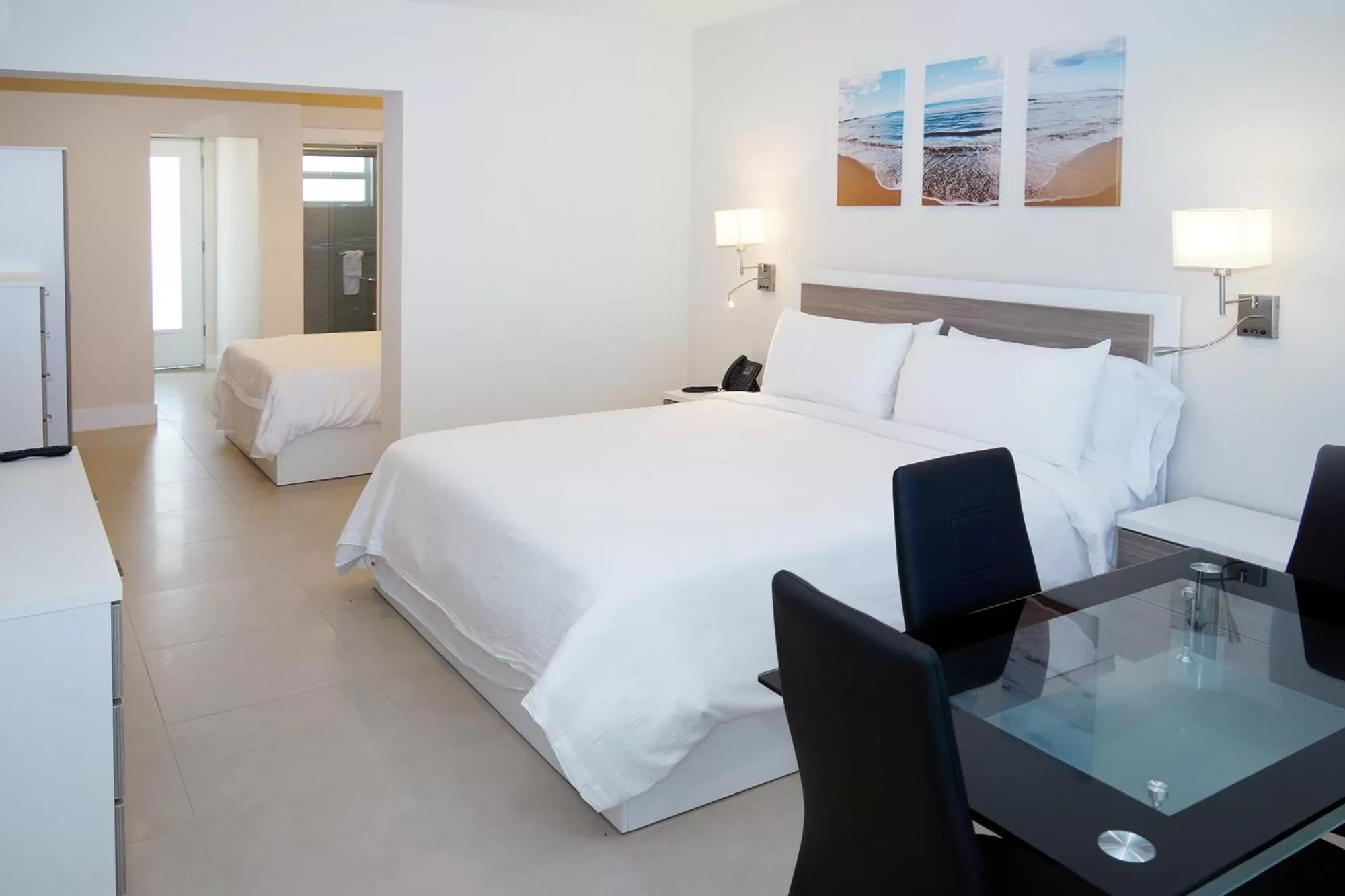 Dining area, Bed in Diane Oceanfront Suites