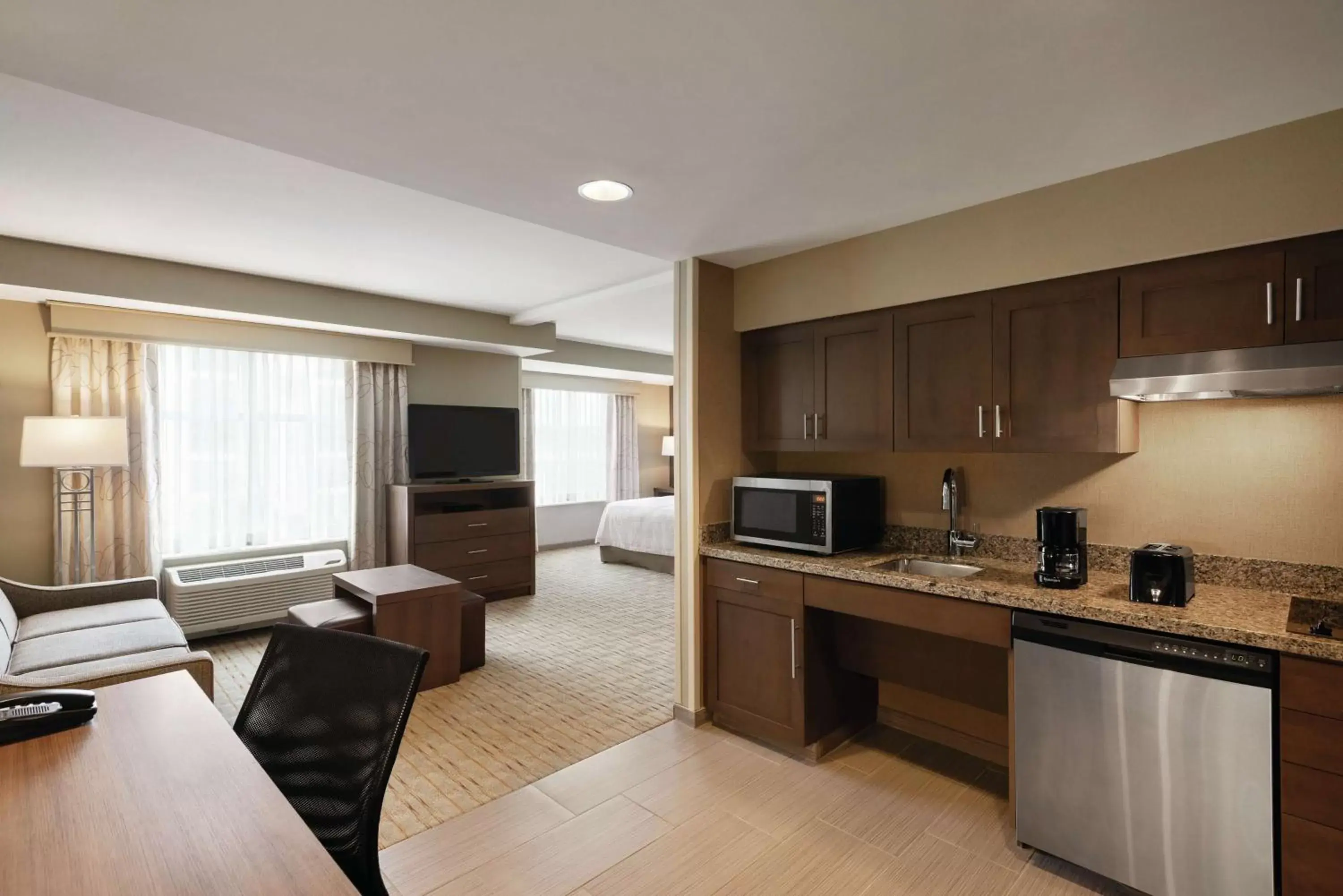 Bedroom, Kitchen/Kitchenette in Homewood Suites by Hilton - Charlottesville
