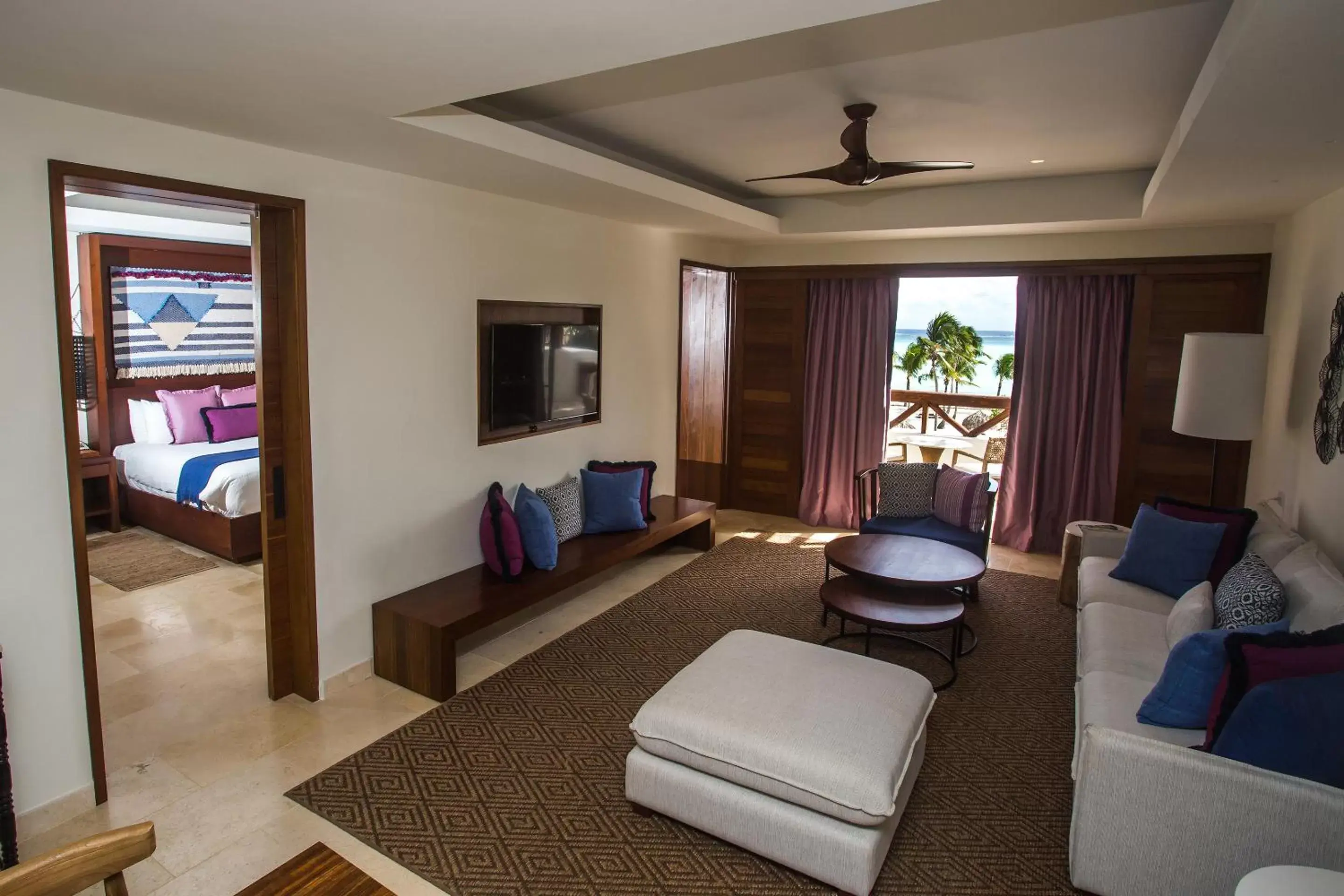 Living room, Bed in Secrets Cap Cana Resort & Spa - Adults Only - All Inclusive Living room, Bed in Secrets Cap Cana Resort & Spa - Adults Only - All Inclusive