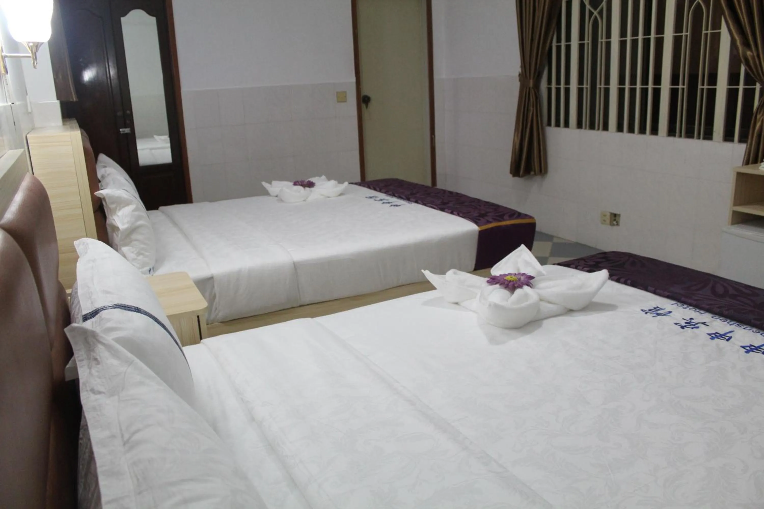 Bed in John Bosco Guesthouse