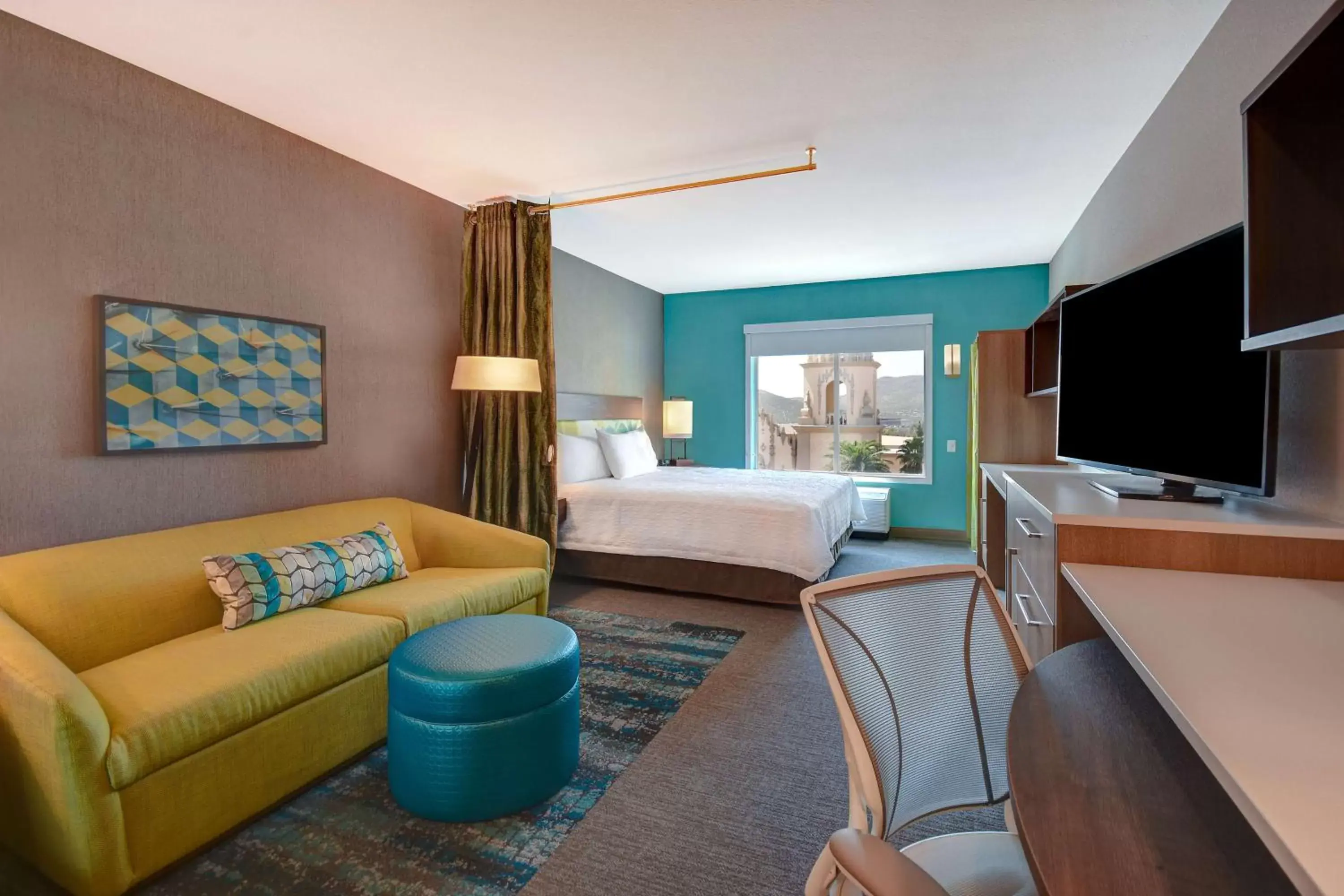 Living room, Bed in Home2 Suites By Hilton Tucson Downtown Living room, Bed in Home2 Suites By Hilton Tucson Downtown