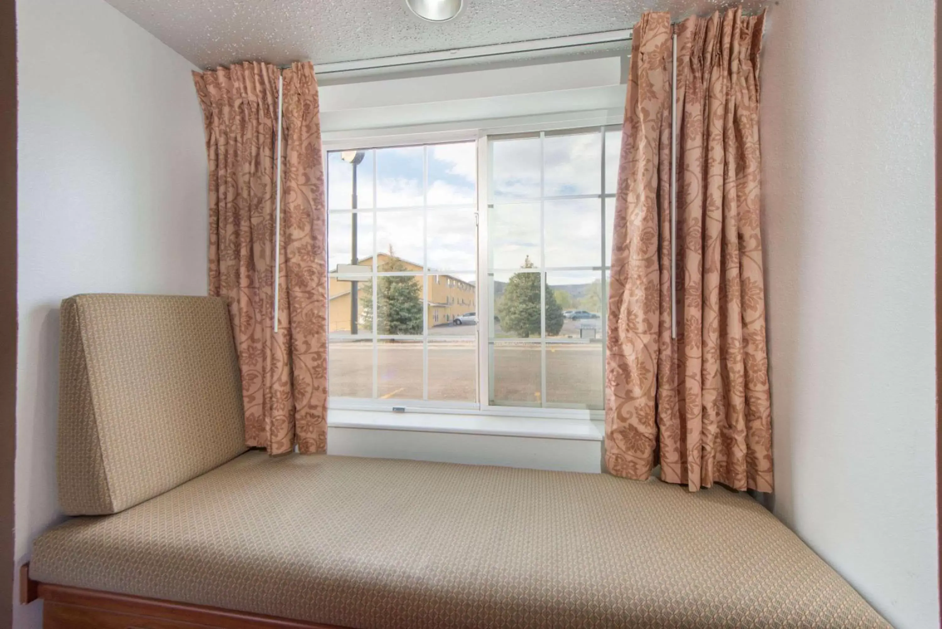 Photo of the whole room, Bed in Microtel Inn & Suites Photo of the whole room, Bed in Microtel Inn & Suites