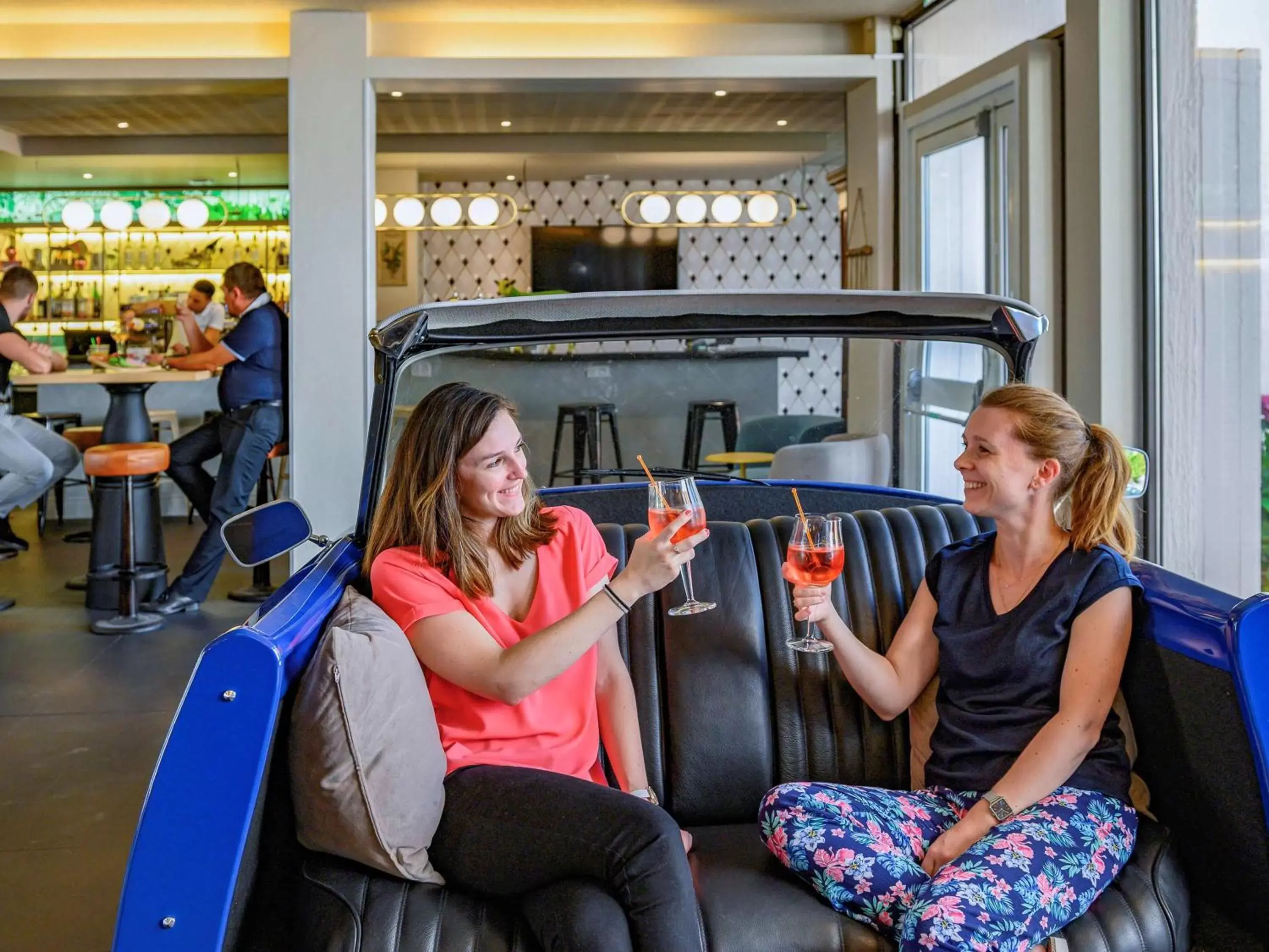 Lounge or bar in Novotel Orléans Sud La Source Lounge or bar in Novotel Orléans Sud La Source