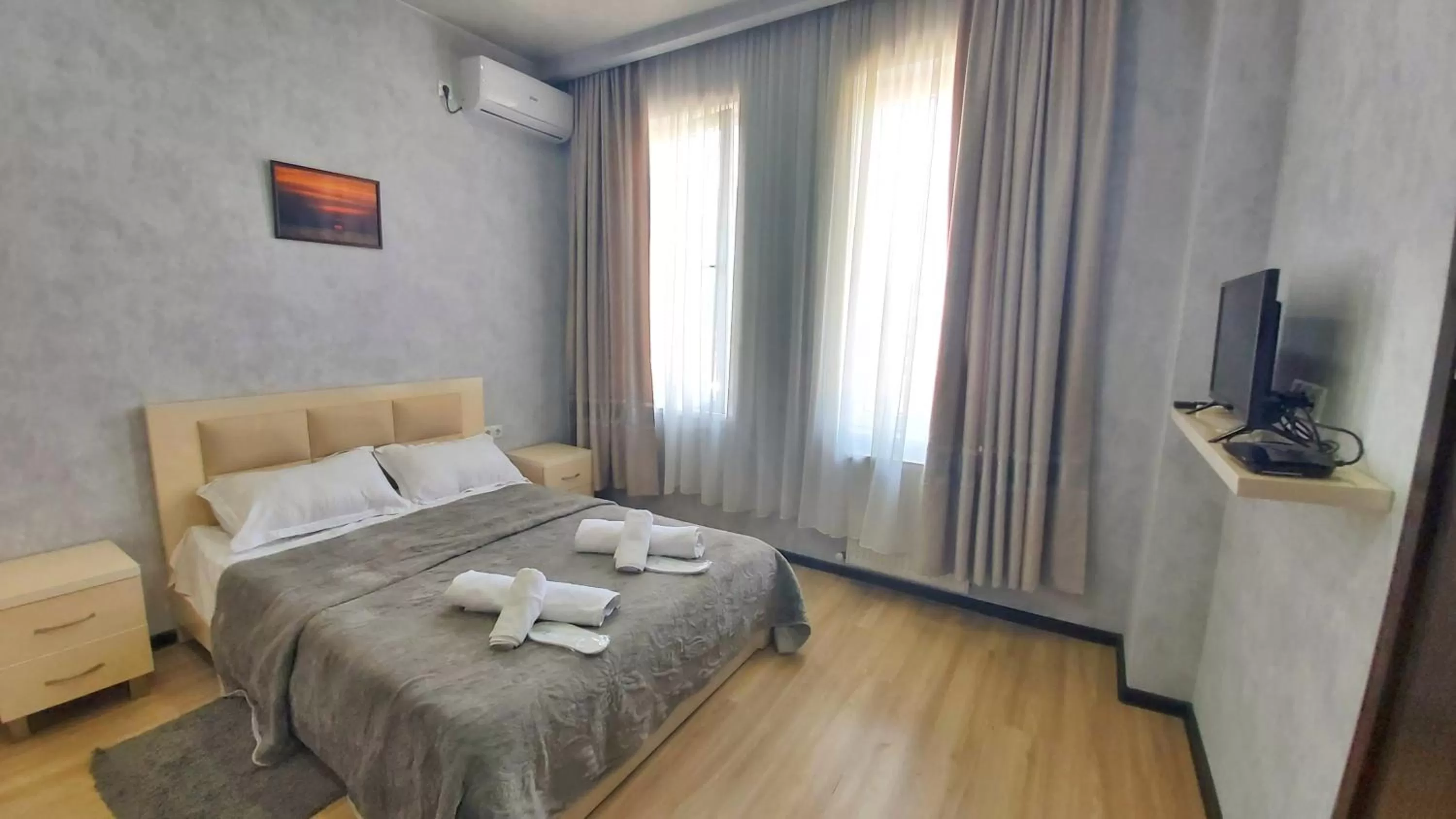 Bed in Gamarjoba Hotel