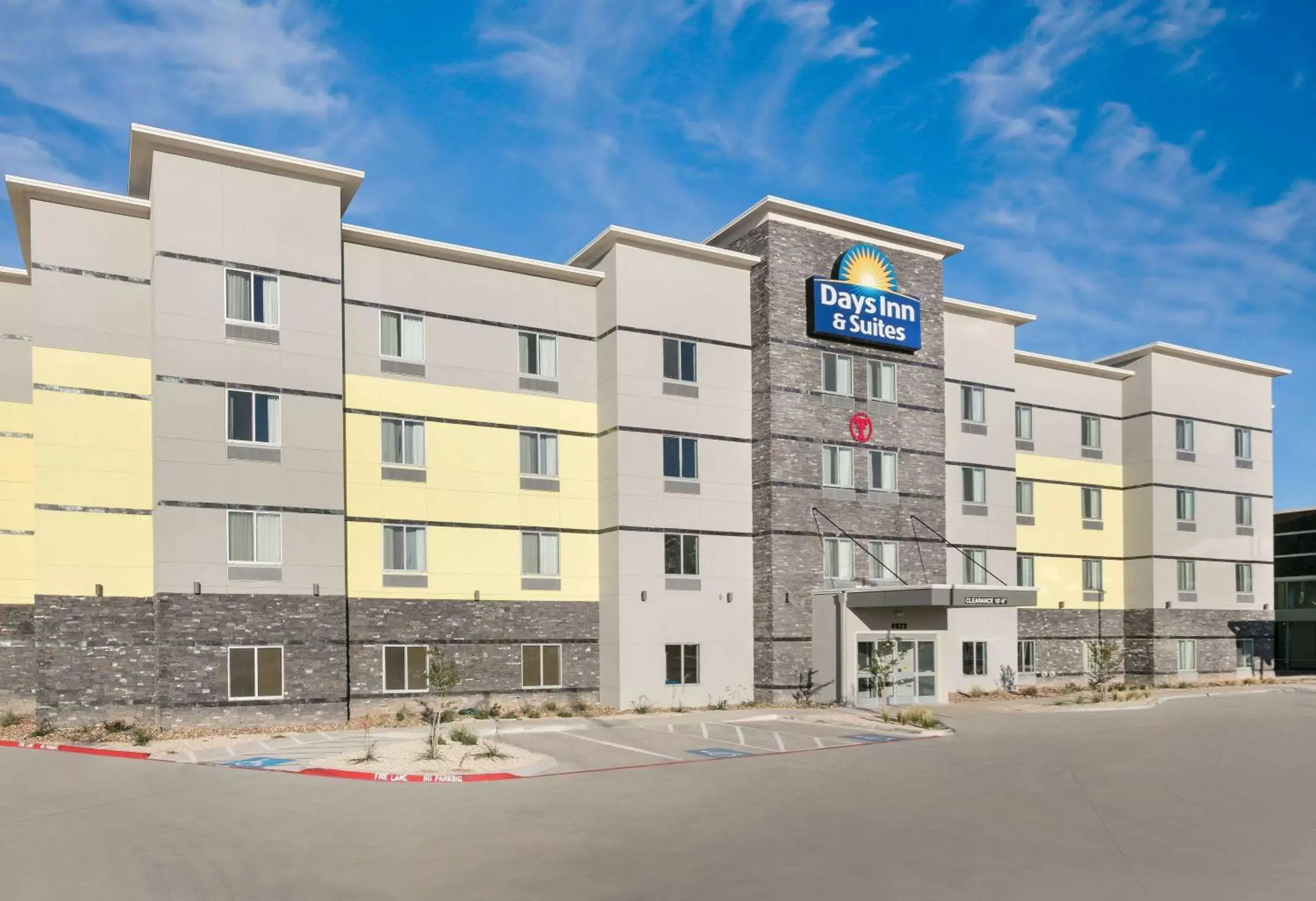 Property building in Days Inn & Suites by Wyndham Lubbock Medical Center
