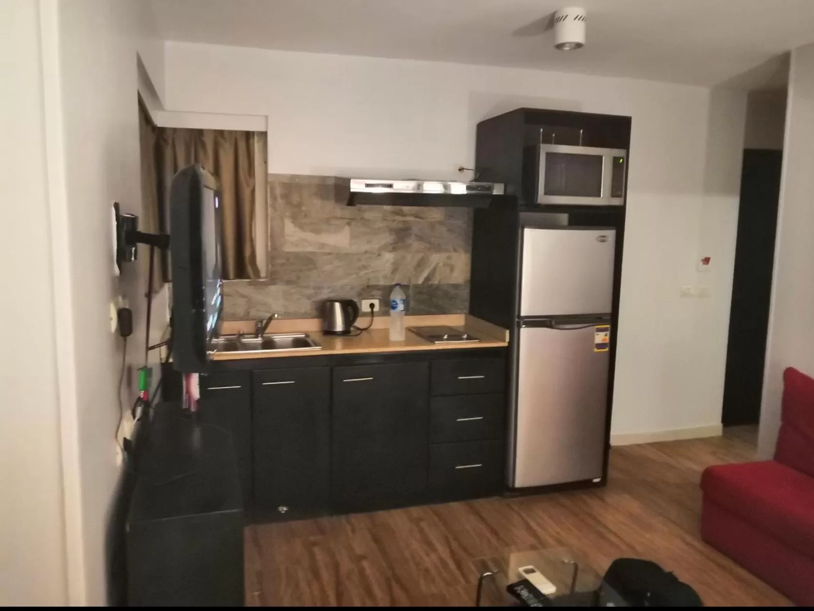 Kitchen or kitchenette in NewCity Hotel & Suites