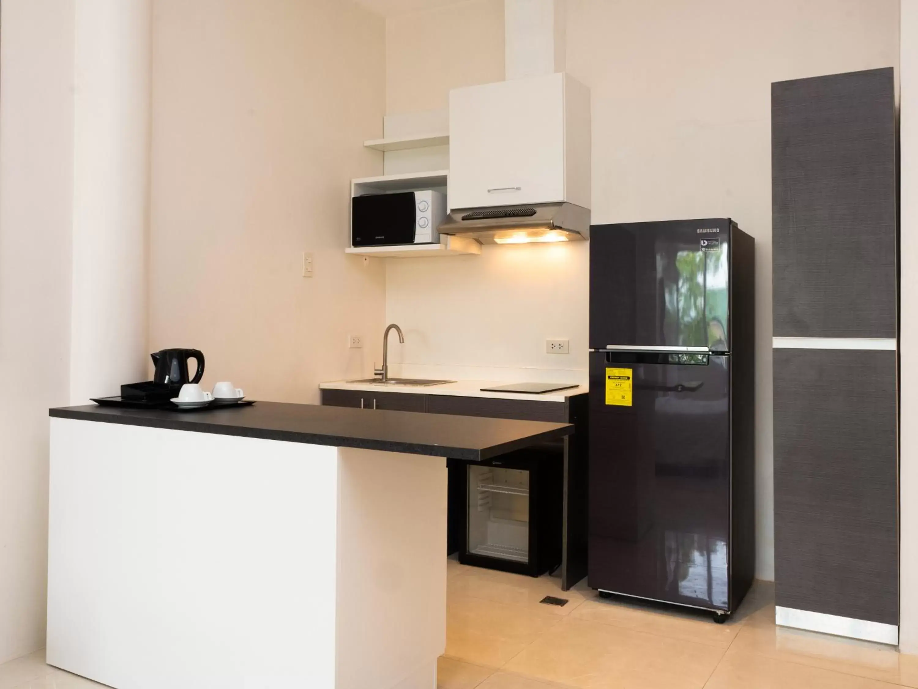 Kitchen or kitchenette, Kitchen/Kitchenette in City Park Hotel Residences