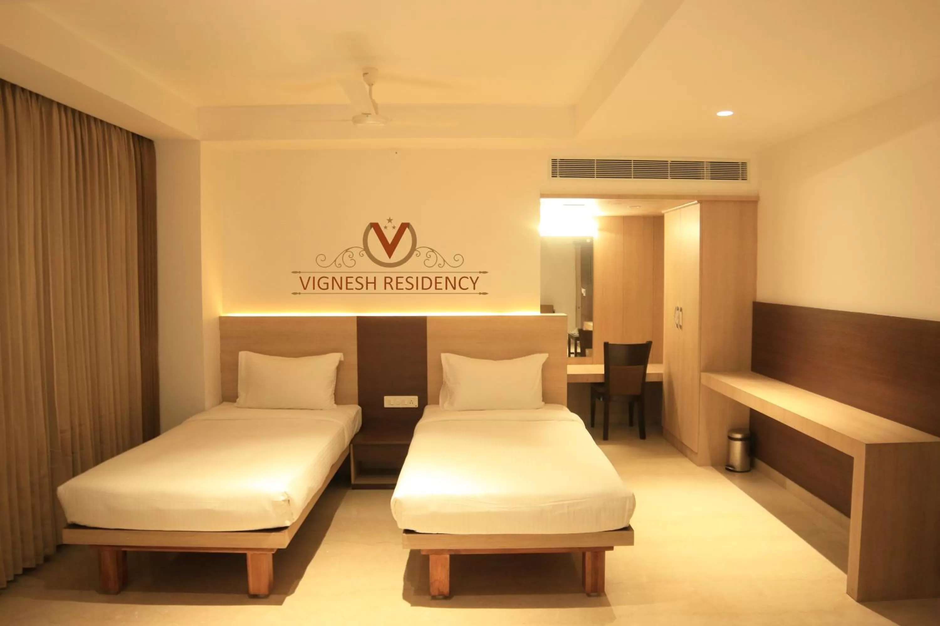 Bed in Vignesh Residency