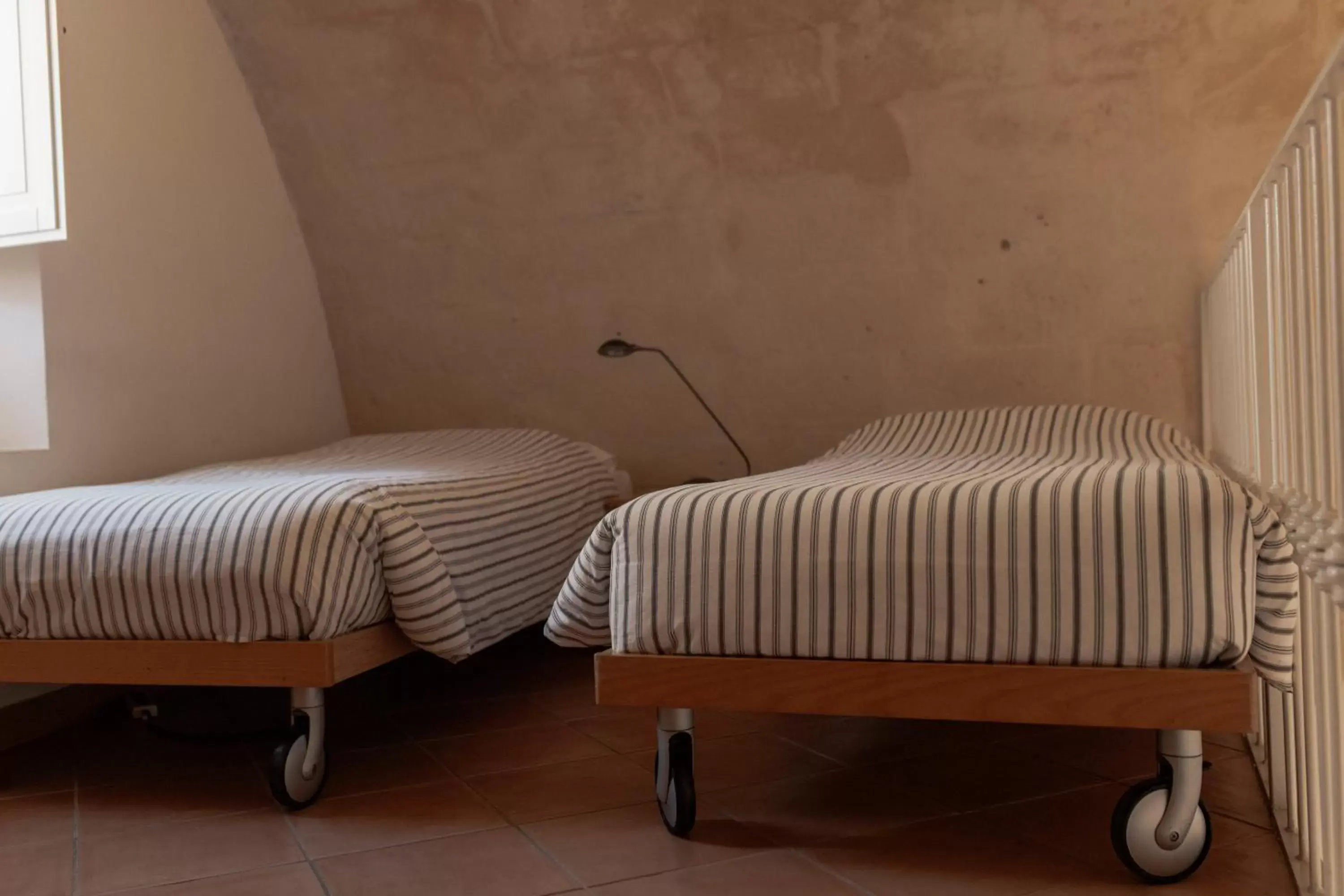 Bed in Il Vicinato, casa vacanza immersa nel cuore dei Sassi