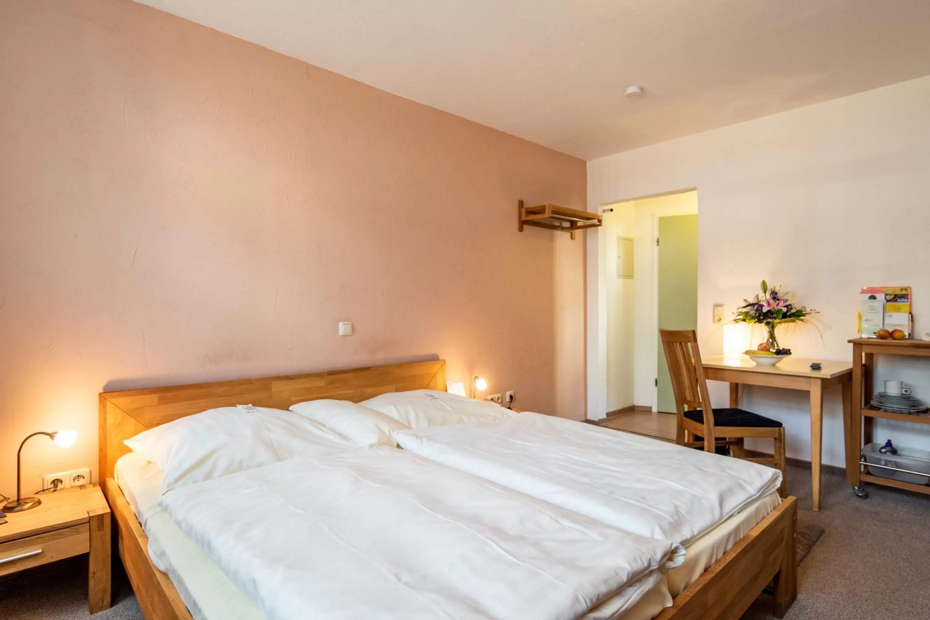 Bed in Hotel Goldflair am Rathaus