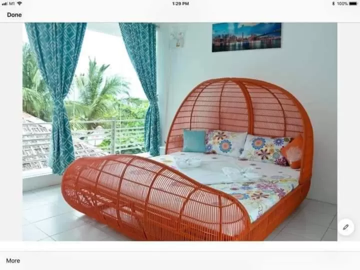 Bed in RRJ's BEACH RESORT