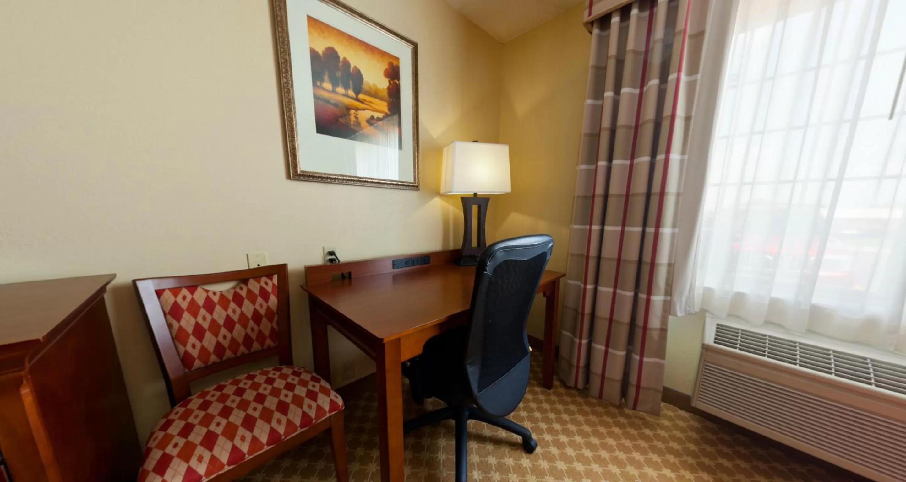 Seating area in Country Inn & Suites by Radisson, Kalamazoo, MI