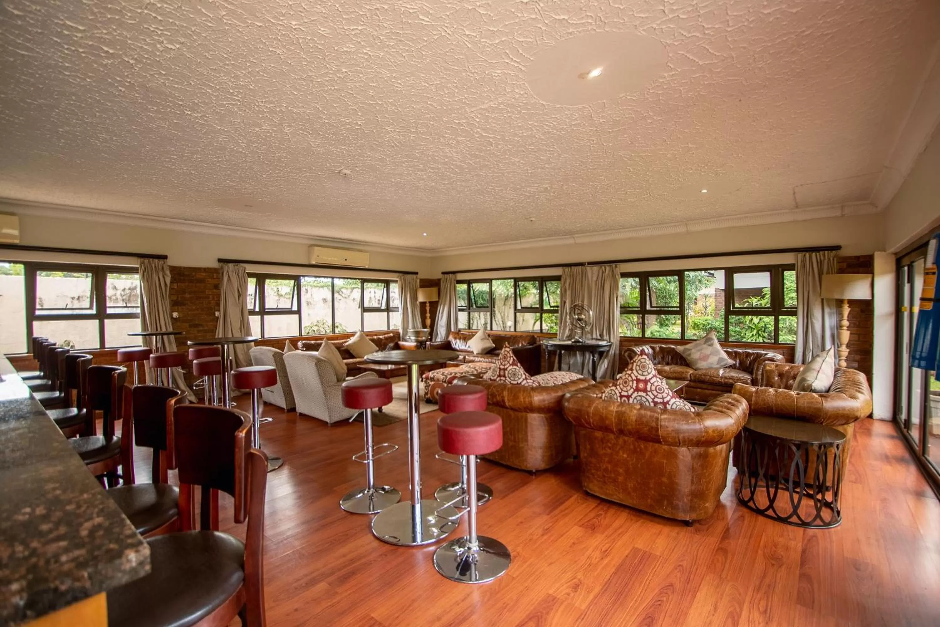 Lounge or bar in The Victoria Falls Deluxe Suites