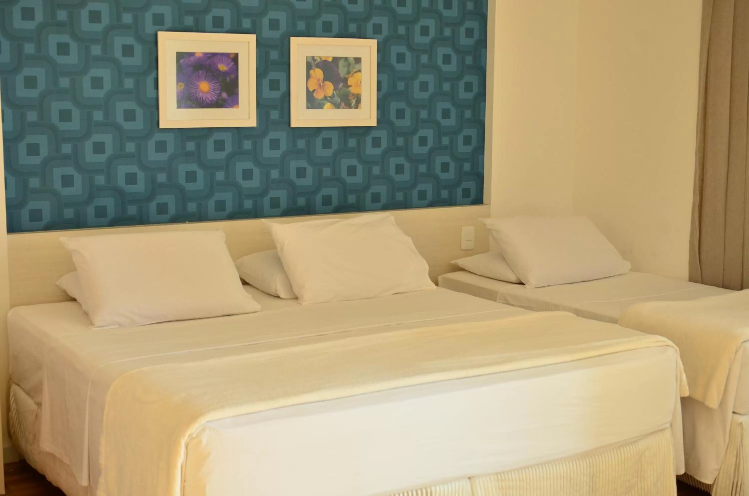 Bed in Unico Apart Hotel