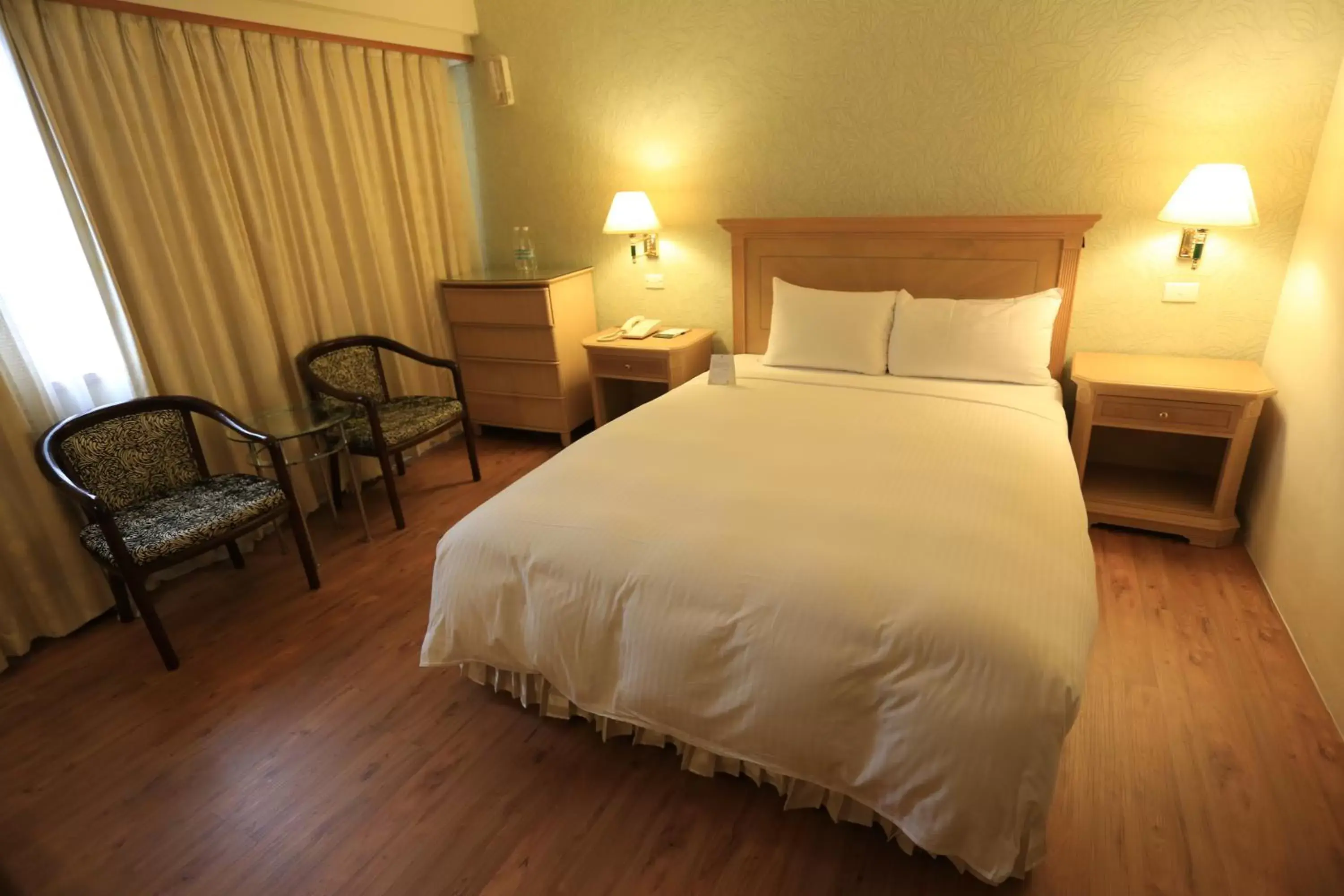 Photo of the whole room, Bed in Cambridge Tainan Hotel