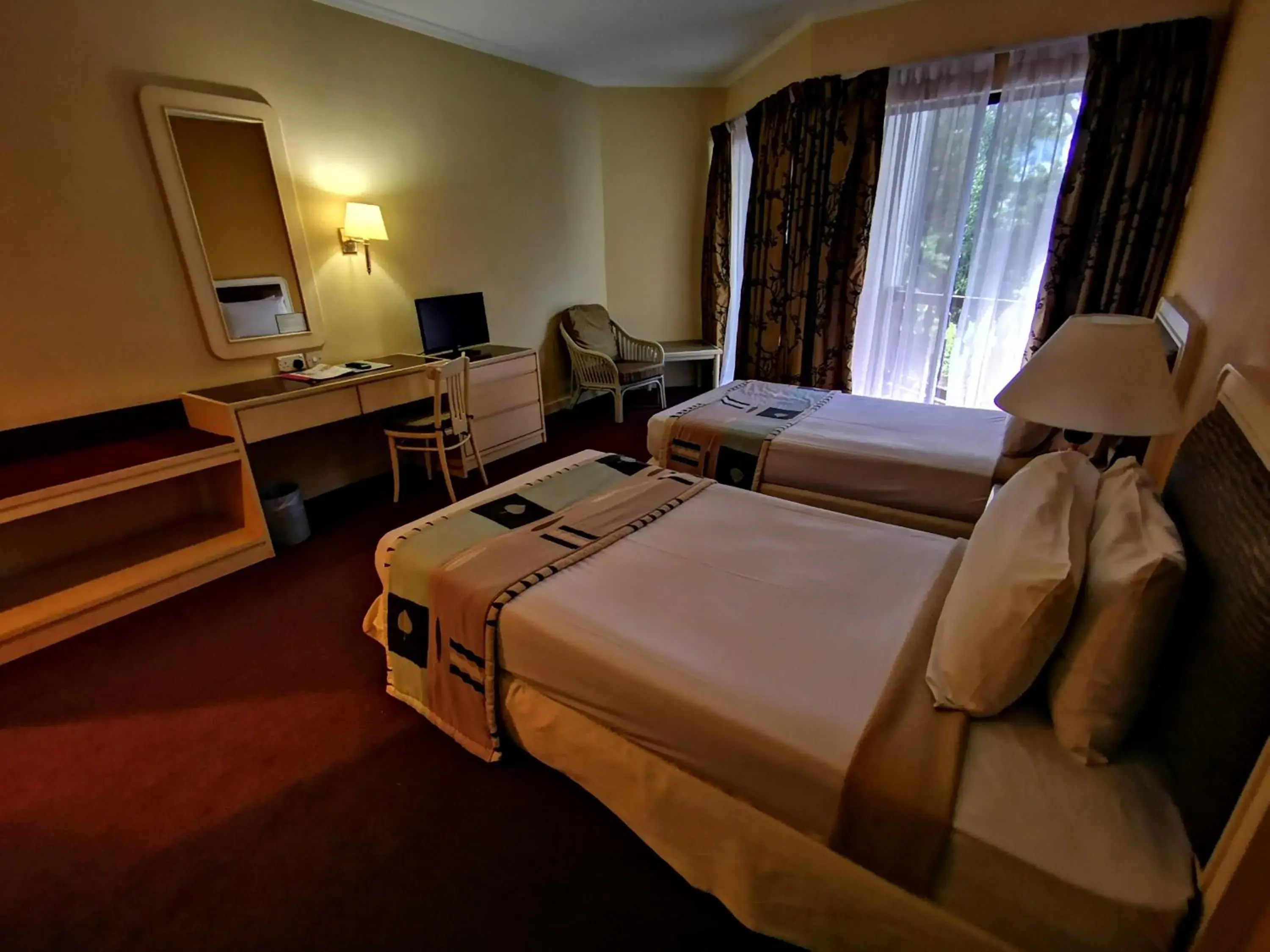 Garden view, Bed in The Grand Beach Resort Port Dickson Garden view, Bed in The Grand Beach Resort Port Dickson