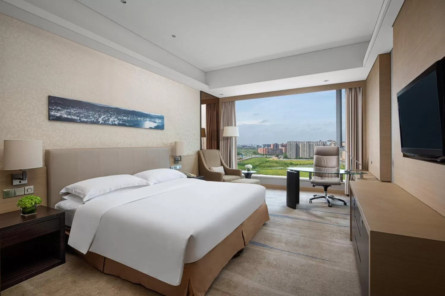 Photo of the whole room, Bed in Crowne Plaza Guangzhou Huadu by IHG - Free Shuttle bus between hotel to Exhibition Center During Canton Fair