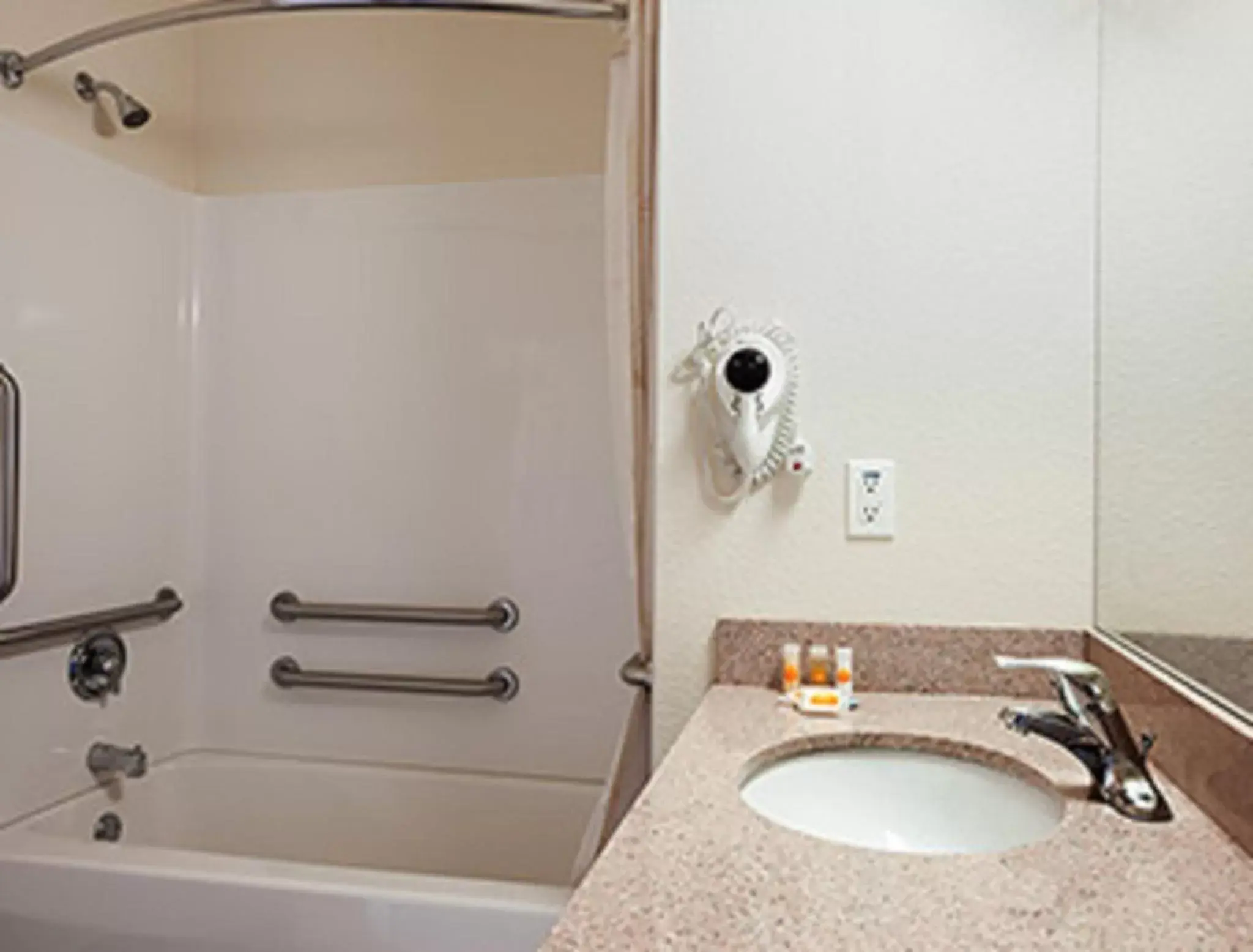 Bathroom in Days Inn & Suites by Wyndham Columbus NE