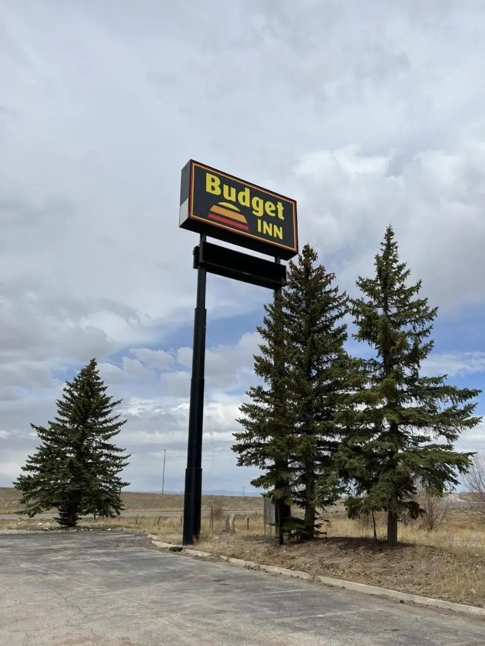 Property logo or sign in Budget Inn Laramie