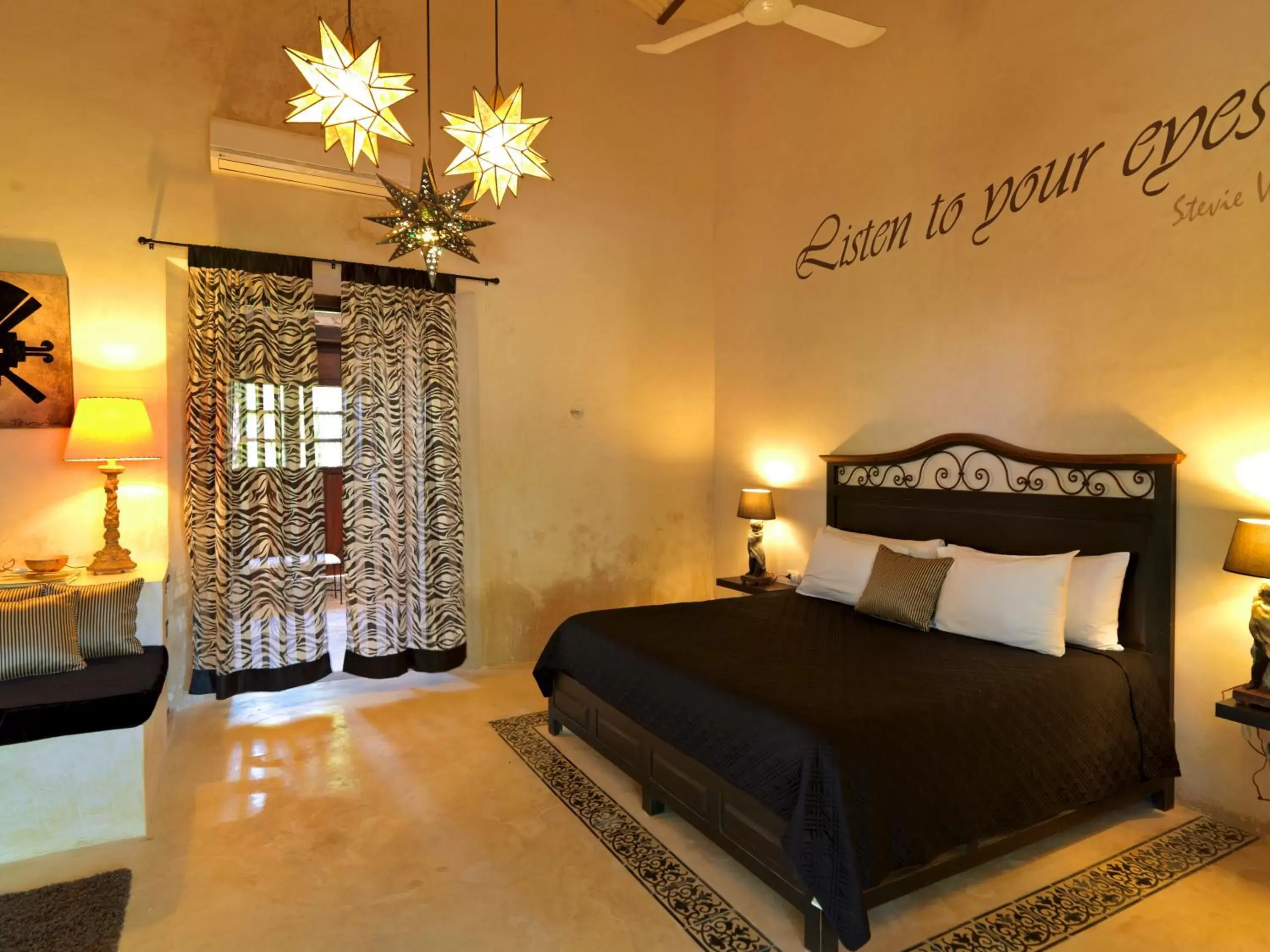 Photo of the whole room, Bed in Hacienda Sacnicte