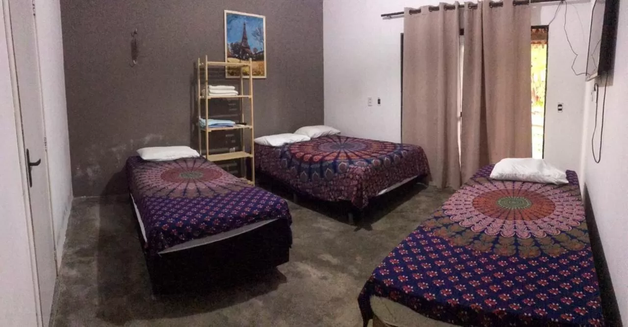 Bed in Pousada Casa de Vó