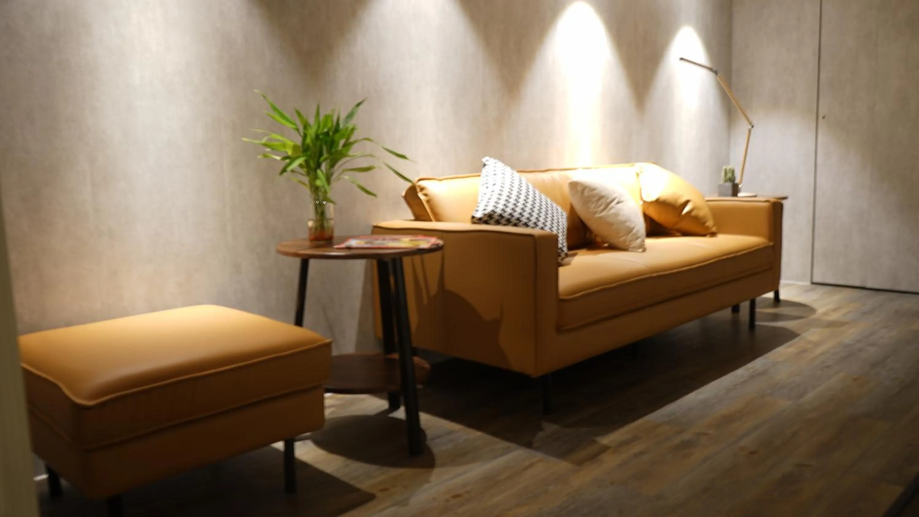 Communal lounge/ TV room in Homy Inn North Point