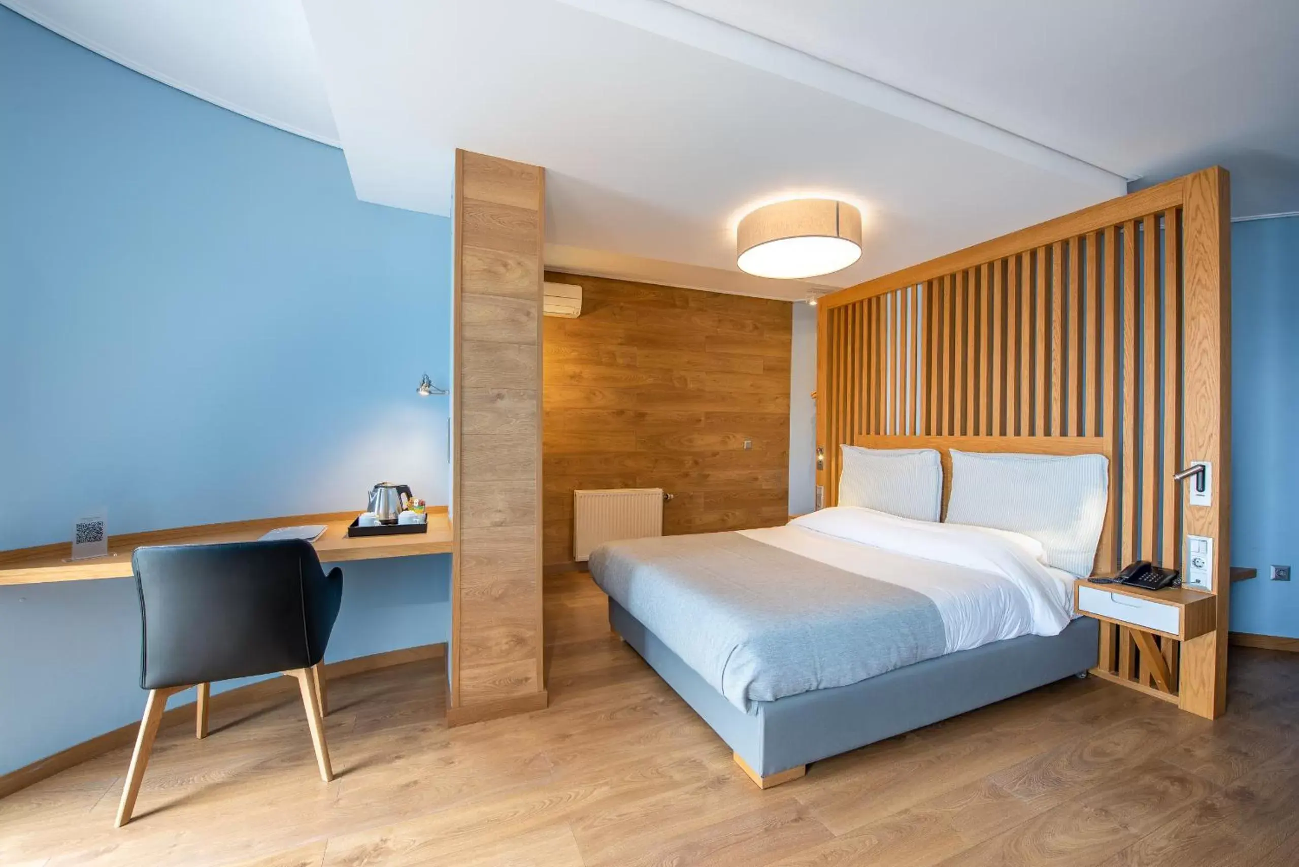 Bedroom, Bed in Heliotrope Hotels