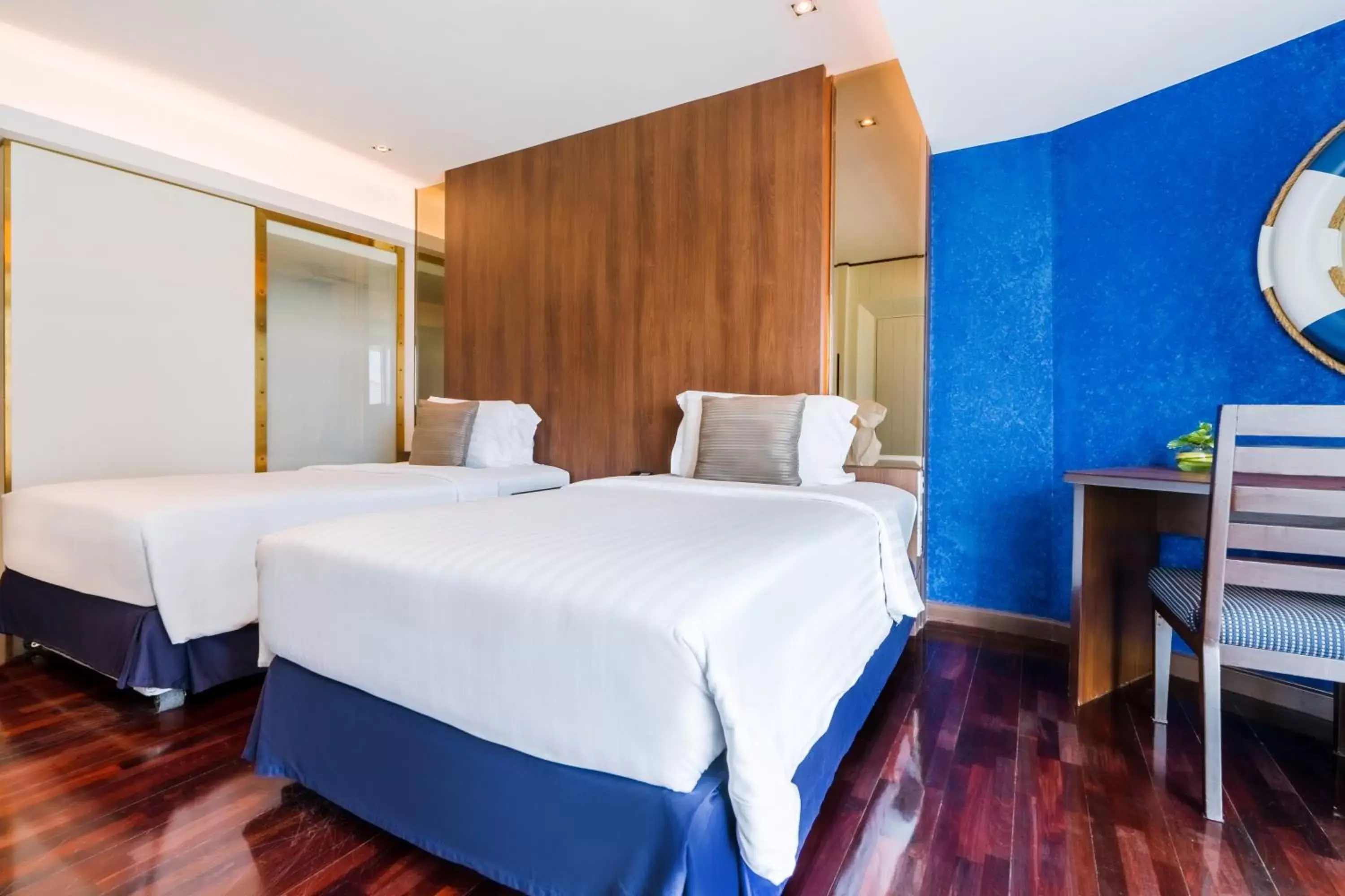 Bed in A-One The Royal Cruise Hotel Pattaya - SHA Extra Plus