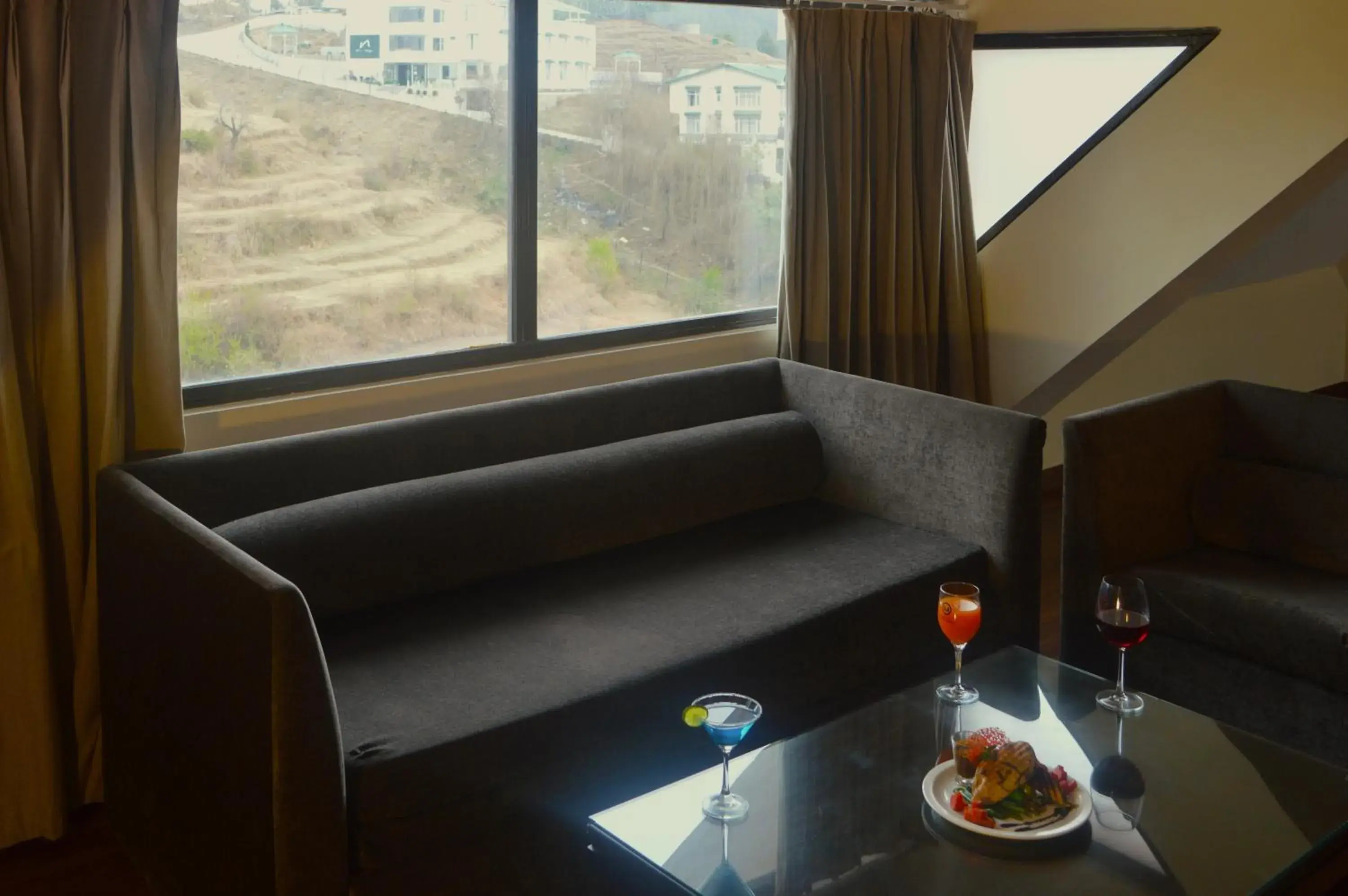 Bathroom, Seating Area in Marigold Sarovar Portico Shimla