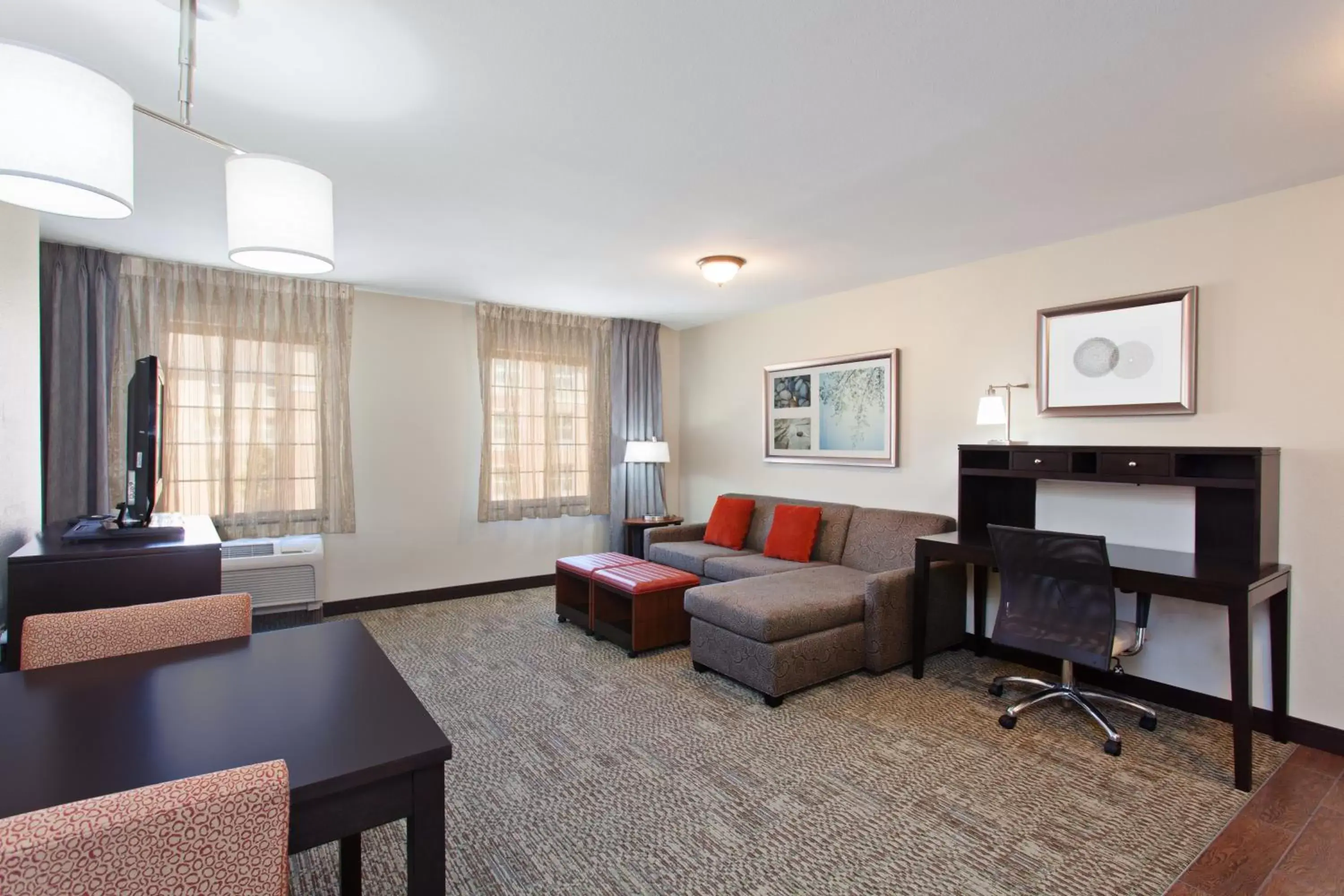 Bed, Seating Area in Staybridge Suites Fairfield Napa Valley Area, an IHG Hotel