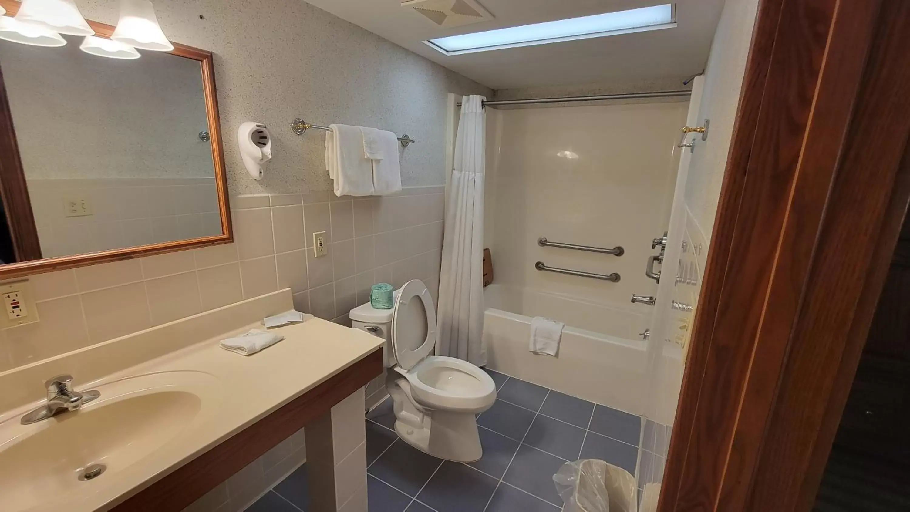 Bathroom in Ramada by Wyndham Saginaw Hotel & Suites