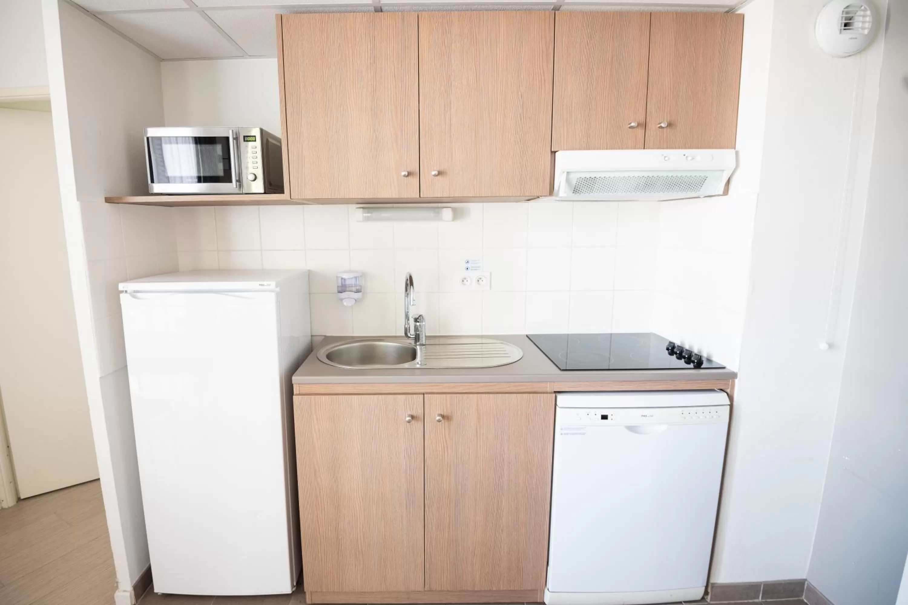 Kitchen or kitchenette in Zenitude Hôtel-Résidences Narbonne Centre
