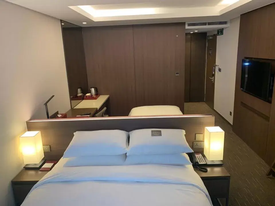 Bed in Ramada Encore by Wyndham Busan Station