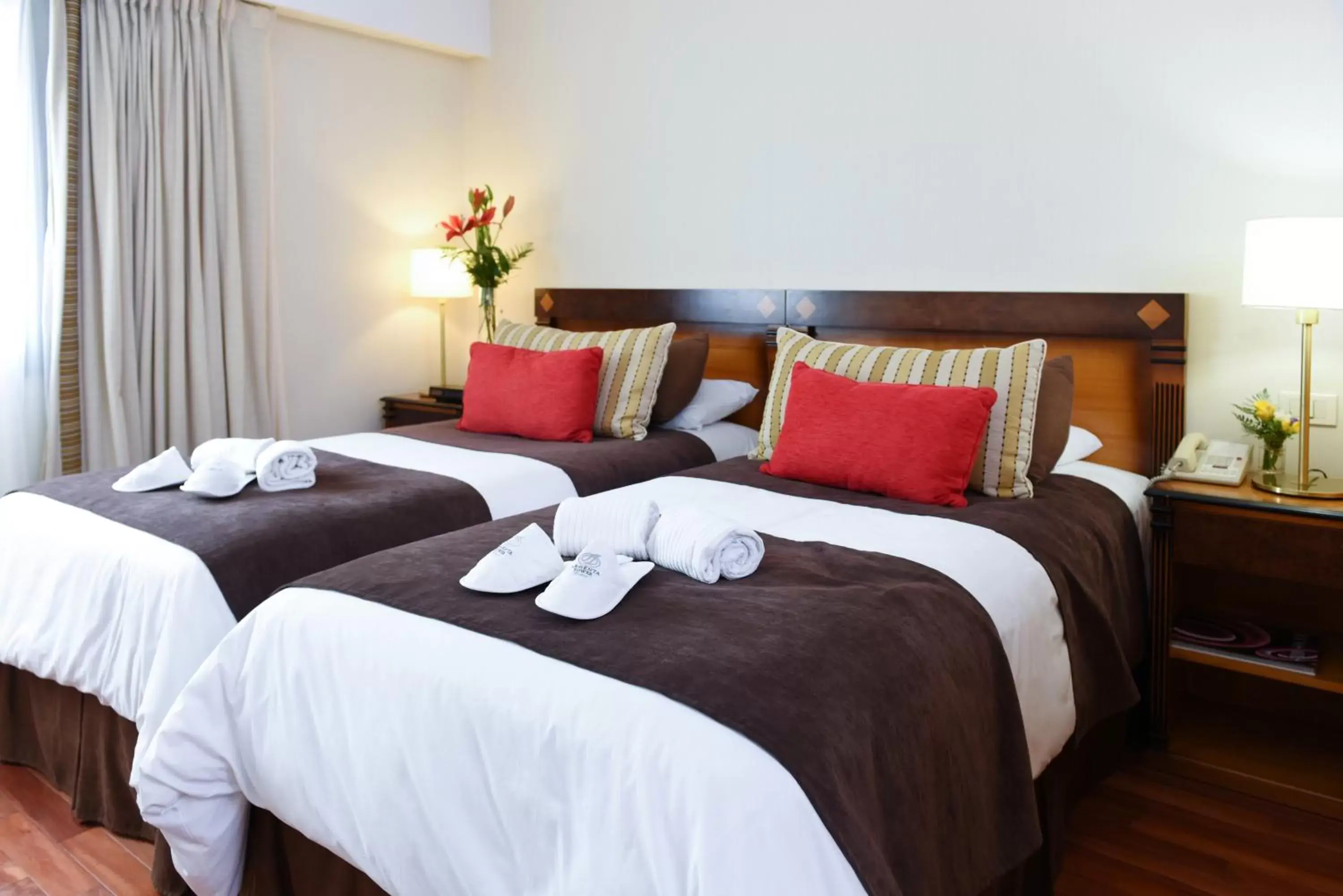 Bed in Argenta Tower Hotel & Suites