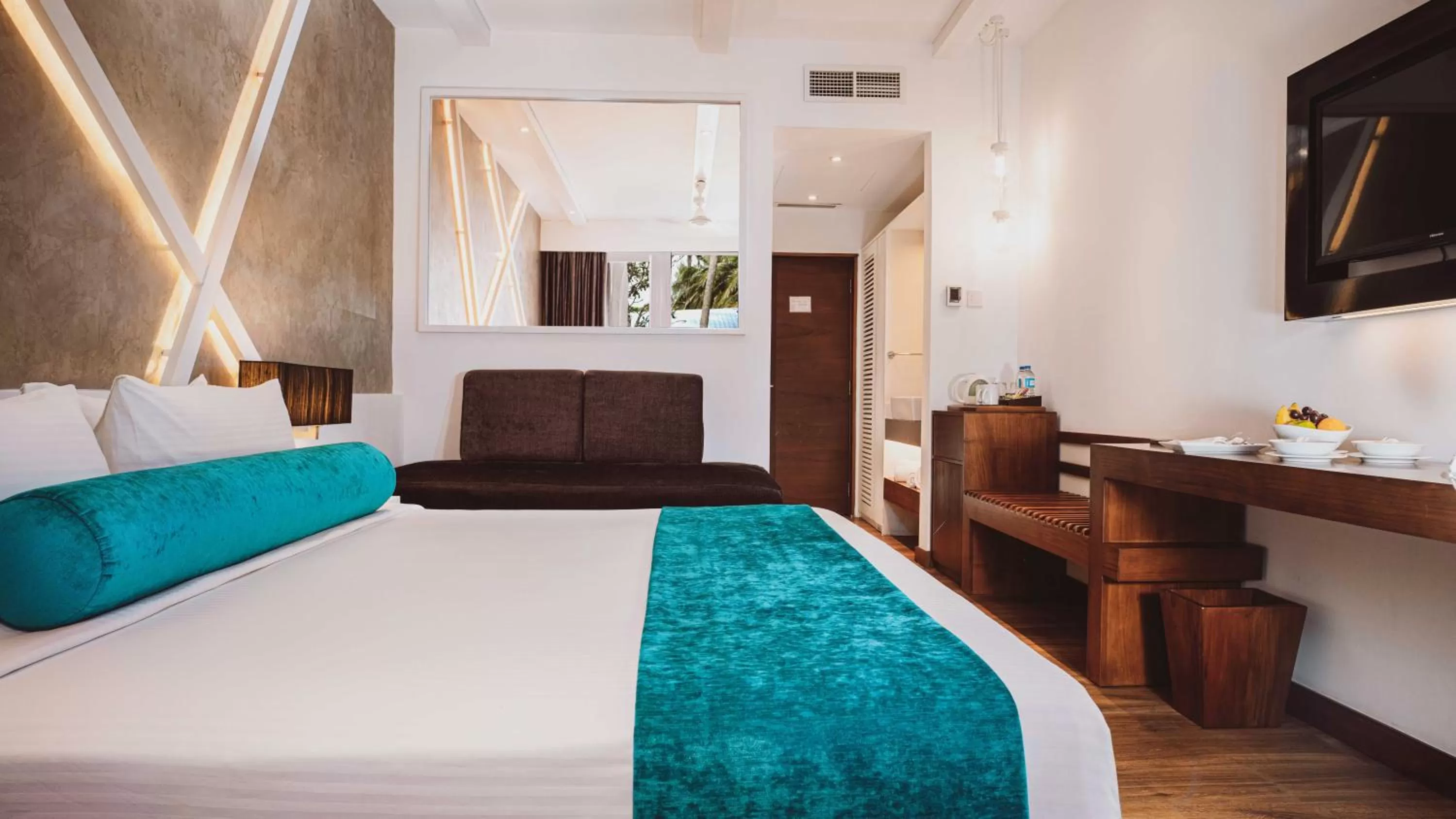 Bed in Camelot Beach Hotel