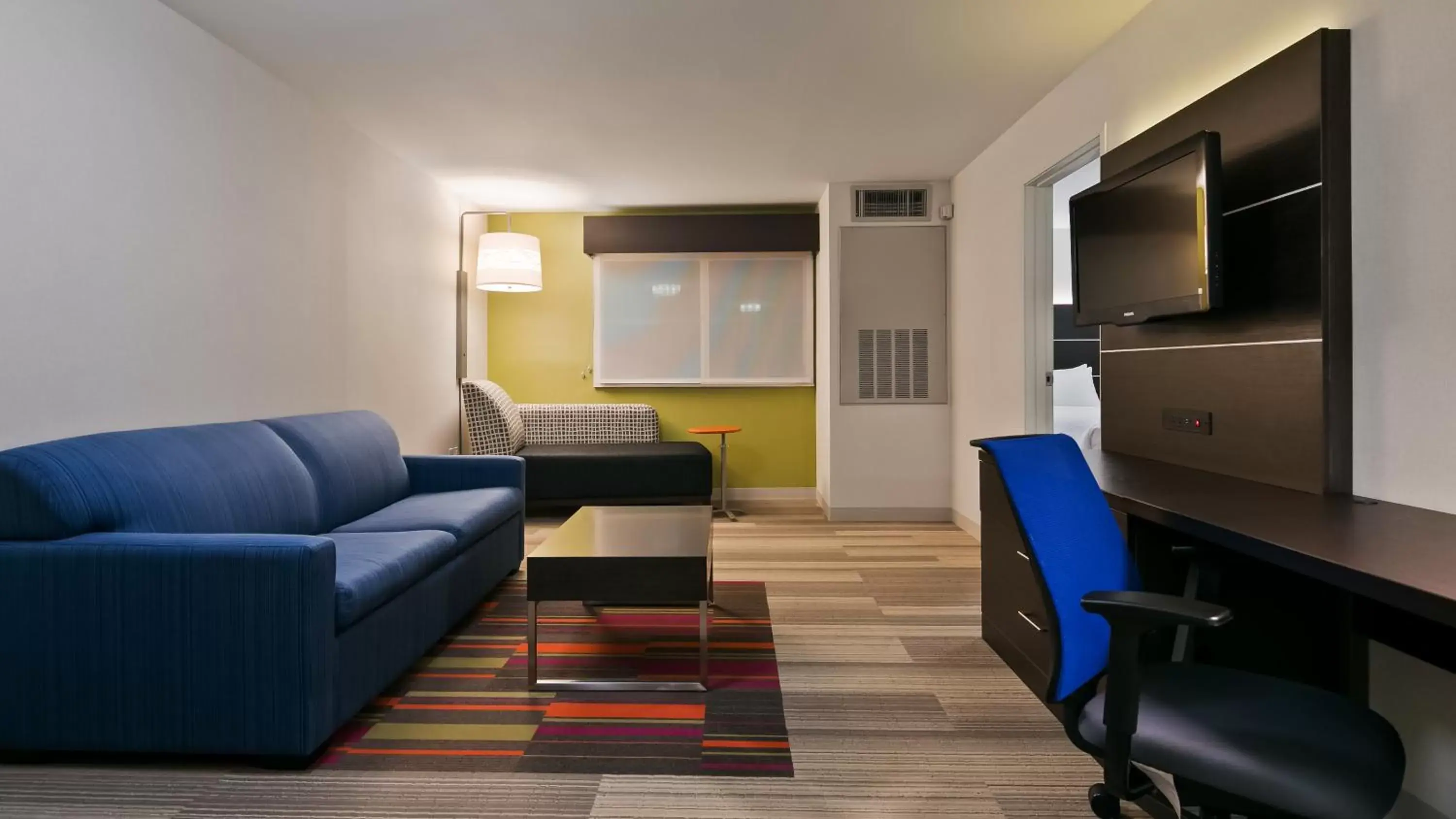 Bedroom, Seating Area in Holiday Inn Express Hotels & Suites Burlington, an IHG Hotel