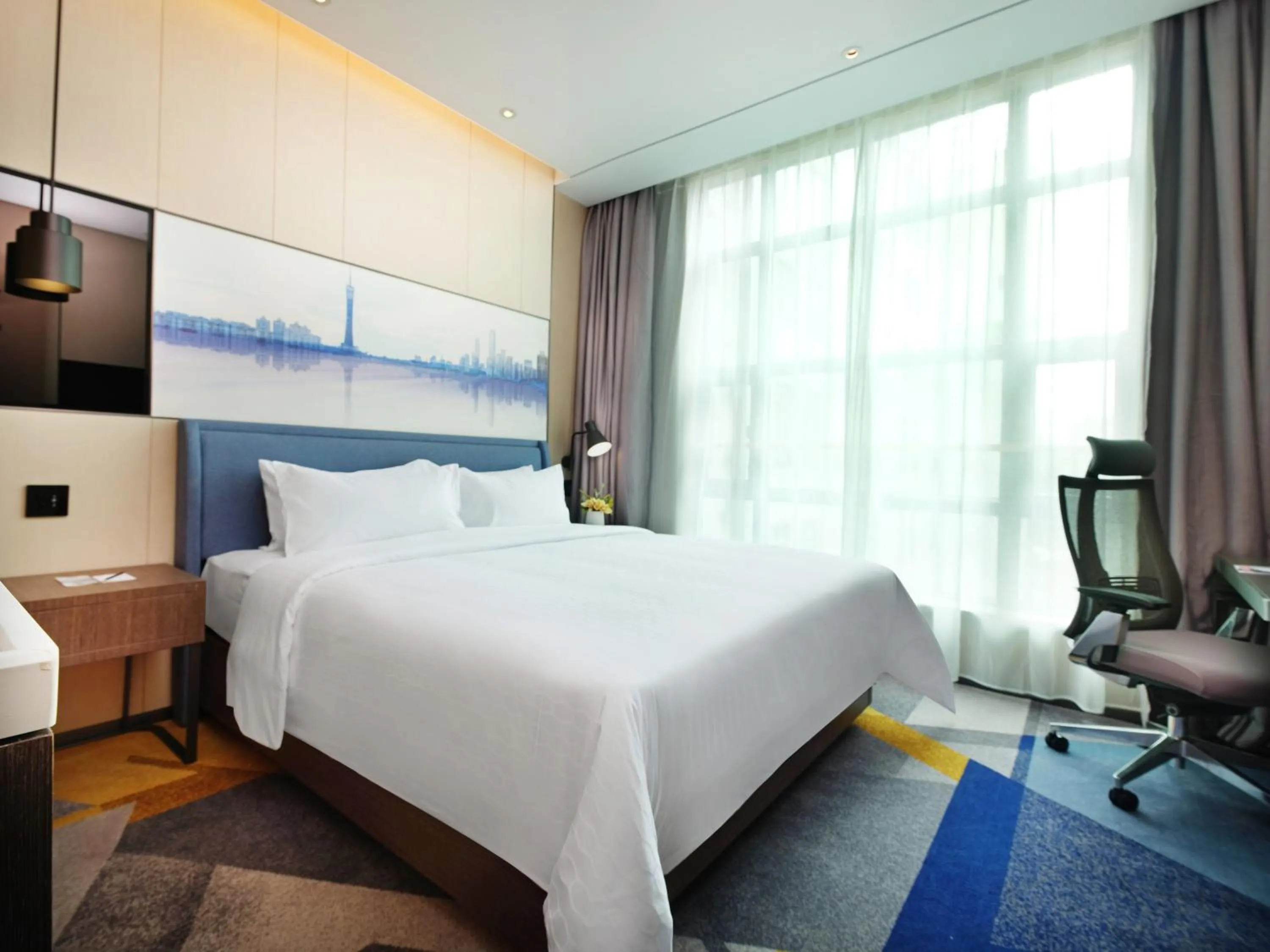 Bed in Hampton by Hilton Guangzhou Tianhe Sports Center
