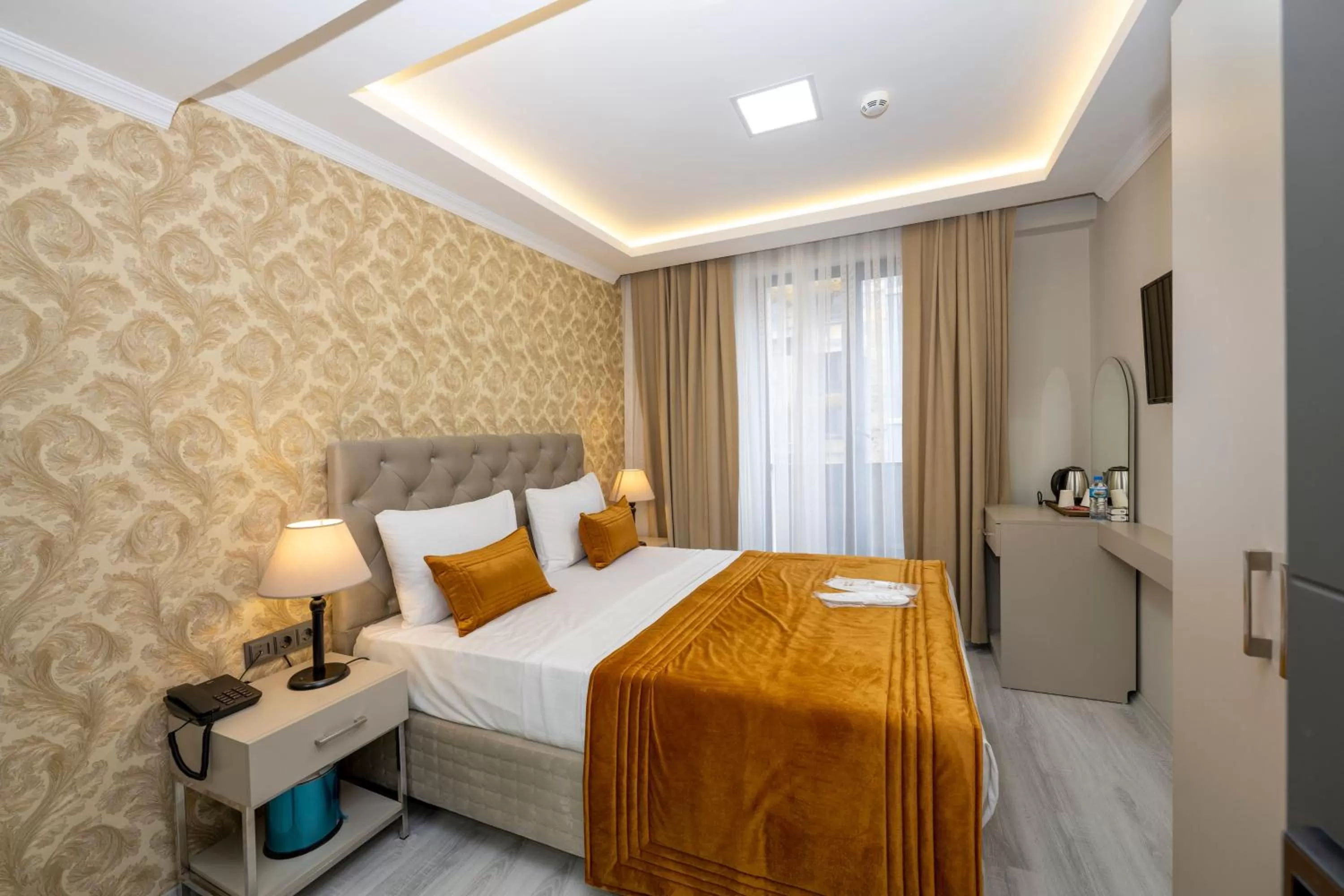 Bed in SKYSTAR DELUXE HOTEL