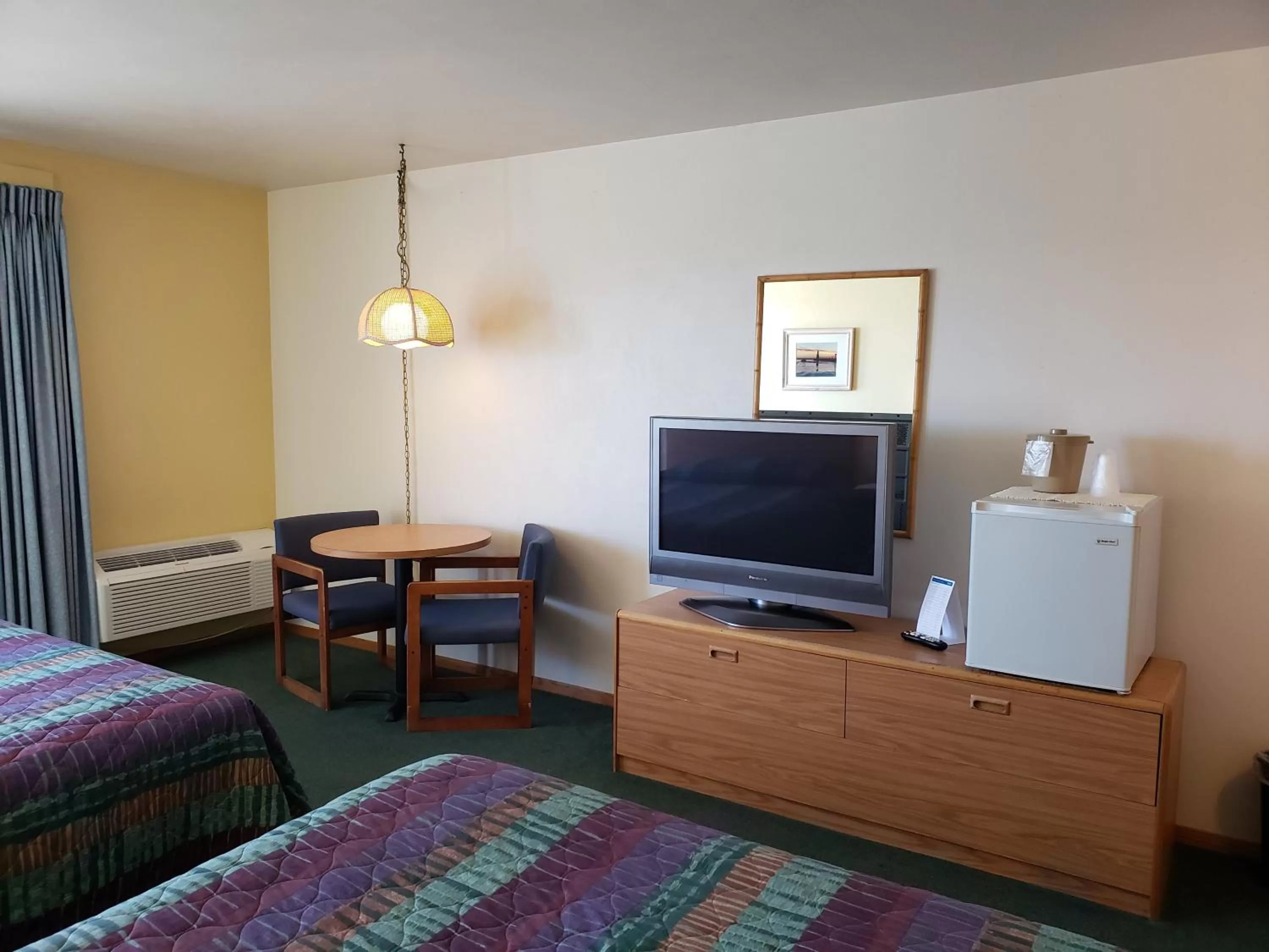 Bed in Algoma Beach Motel