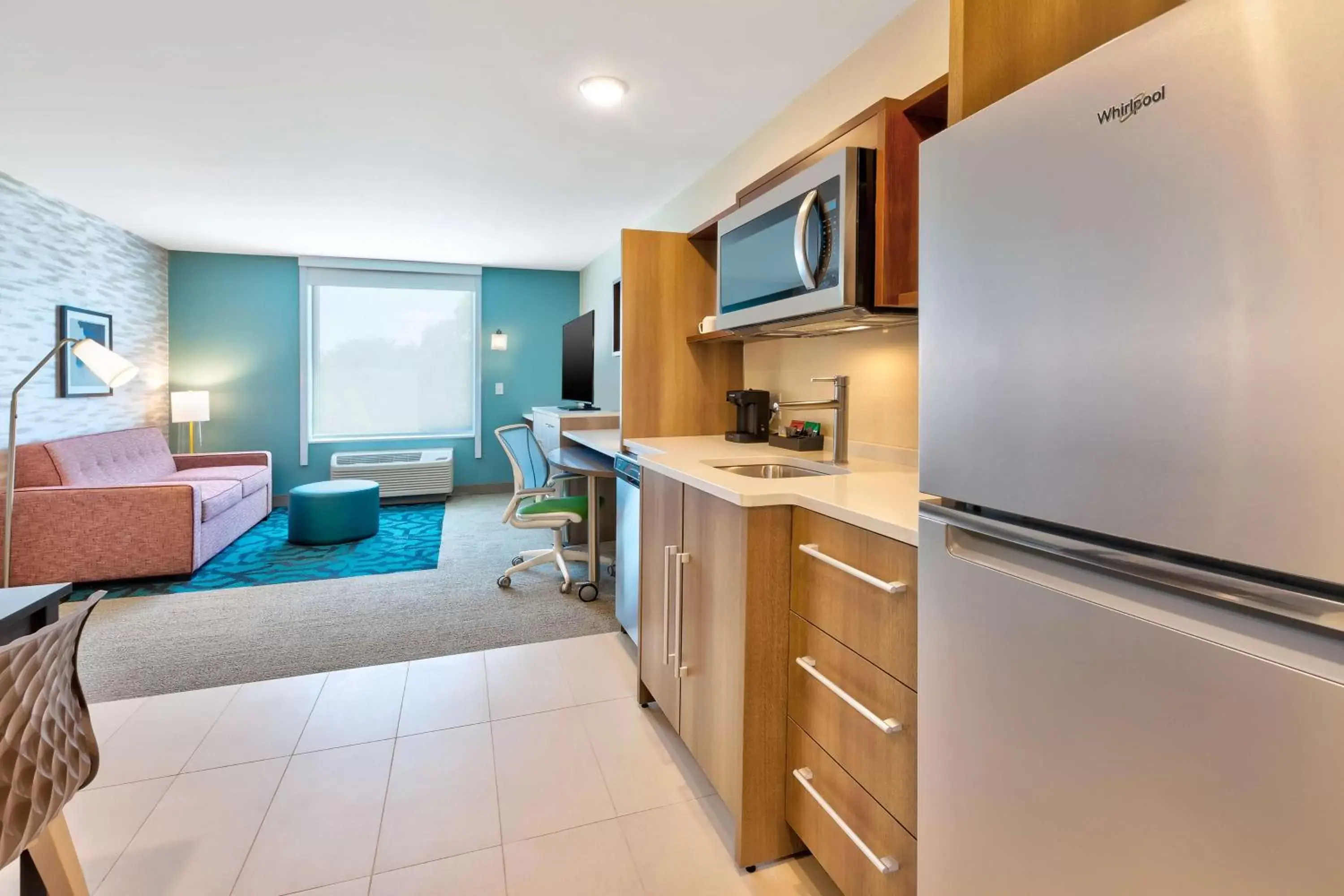 Bedroom, Kitchen/Kitchenette in Home2 Suites By Hilton Grand Blanc Flint, Mi