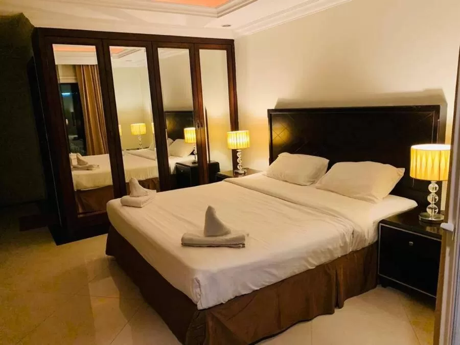 Bed in Ivory Palace Hotel